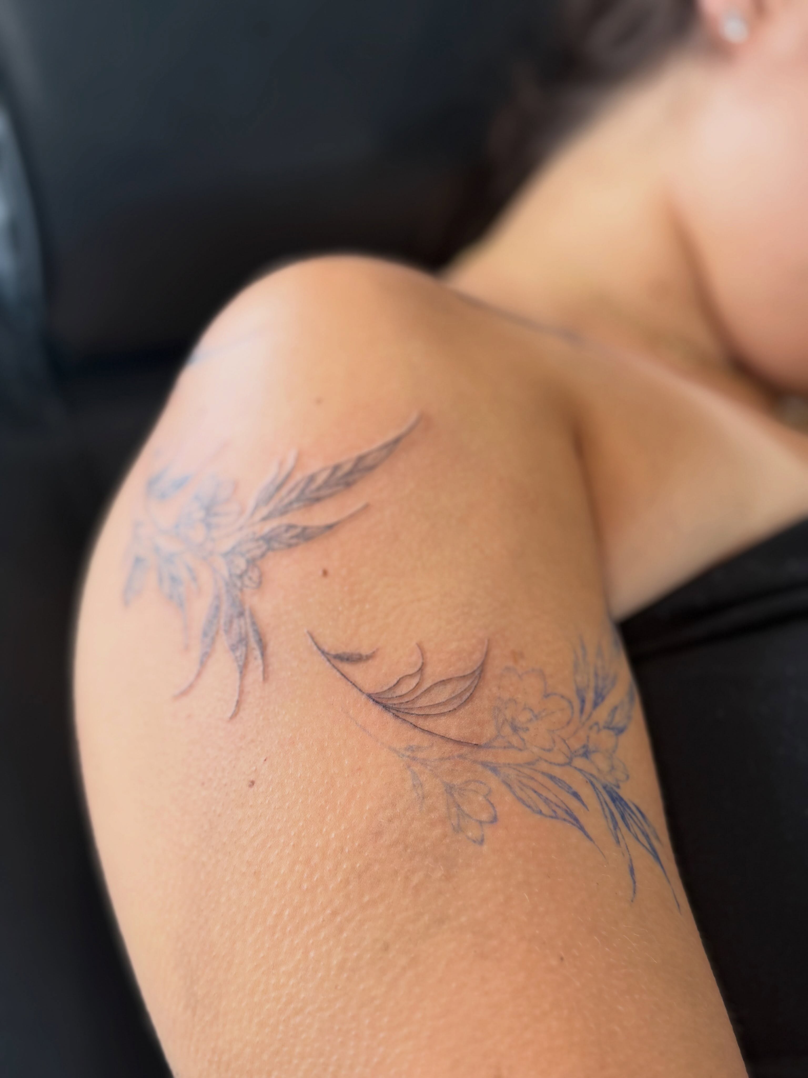 Floral design black and grey tattoo on the shoulder by Silva Wellen