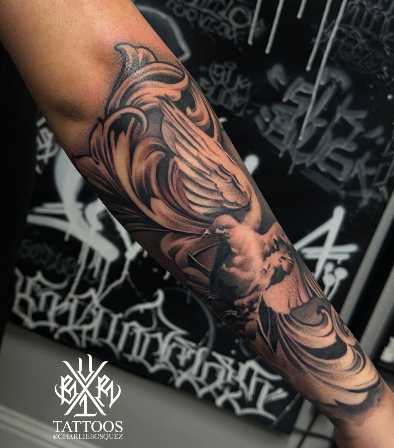 Bird and wave realism tattoo on the forearm by El Beaver Tattoos