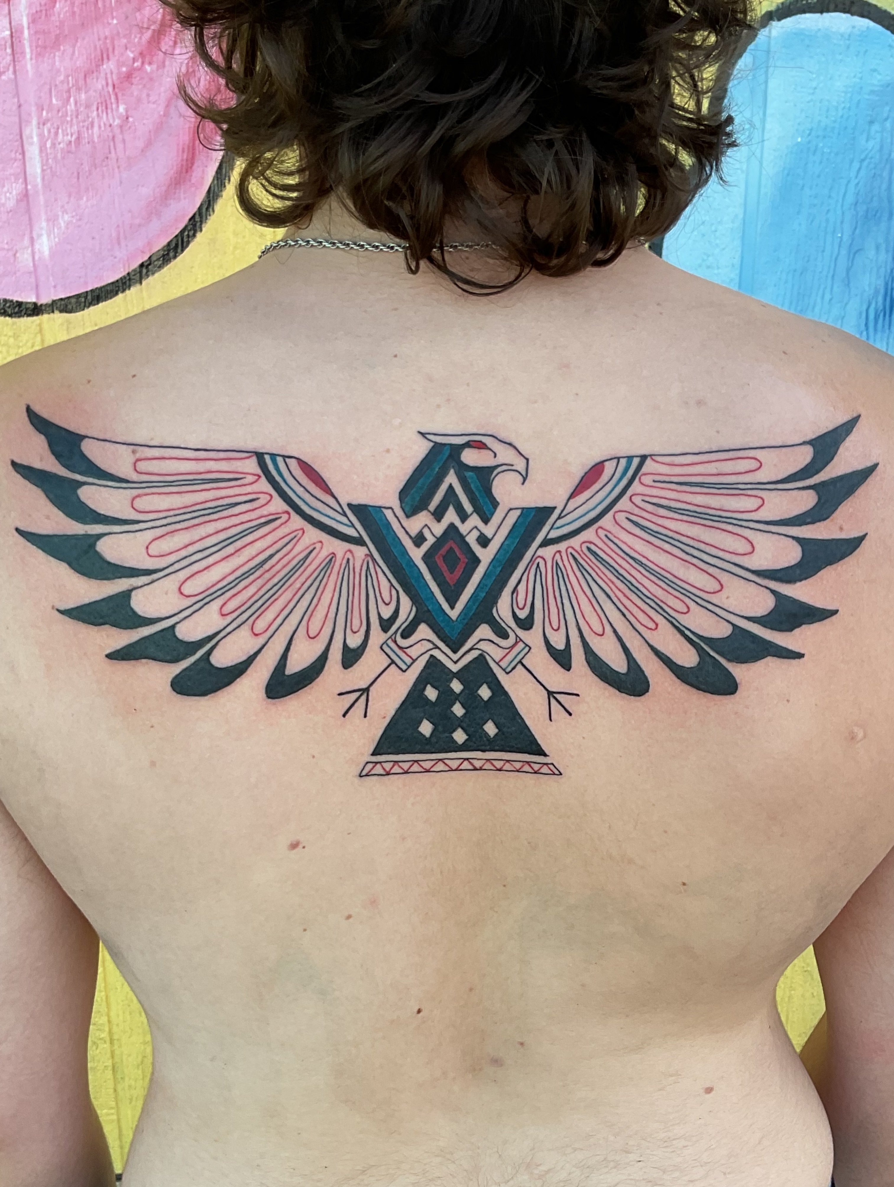 Eagle geometric tattoo on the back by Roachrude