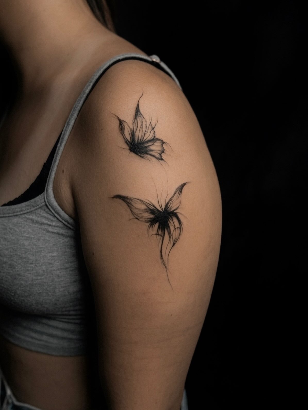 Butterfly black and grey tattoo on the shoulder by David H.