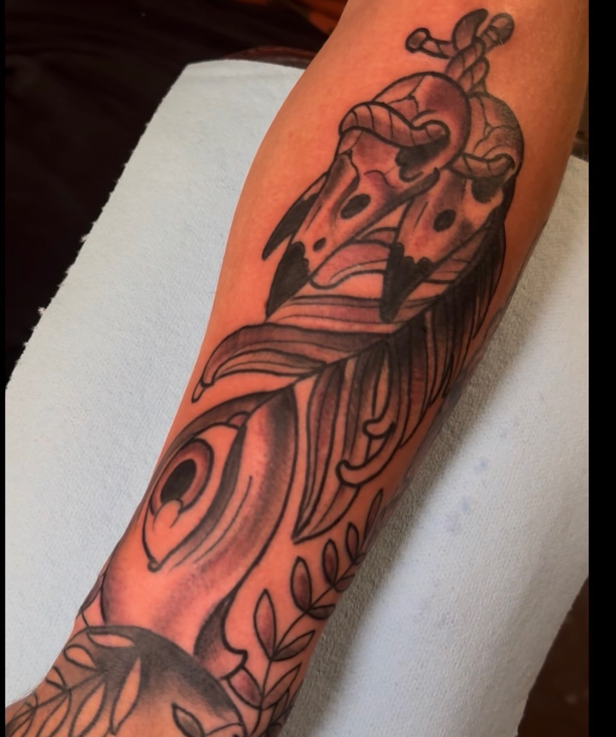 Beetle black and grey tattoo on the forearm by Sean Wilcox, Des Moines, Iowa