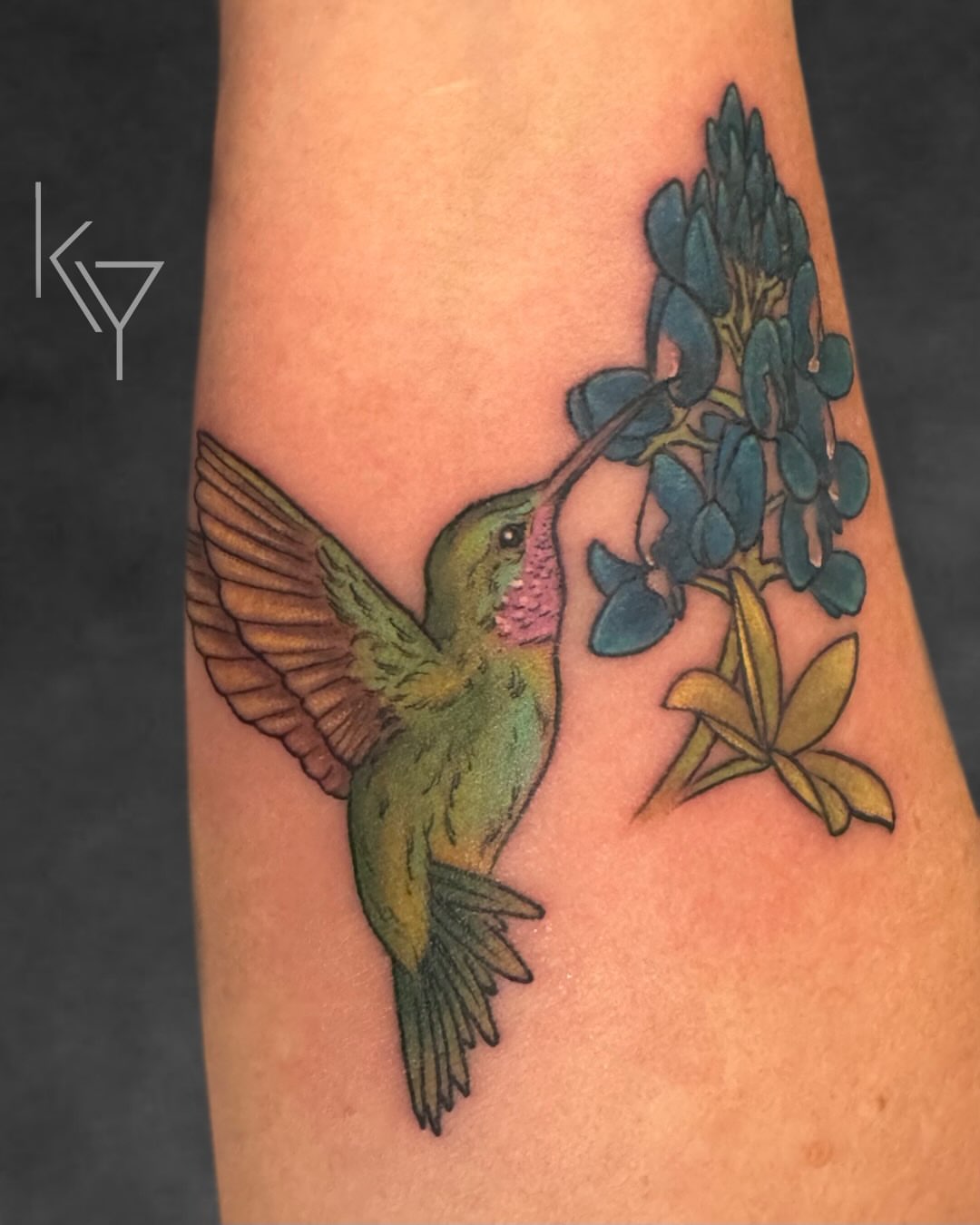 Hummingbird and bluebonnet realism tattoo on the forearm by ..✨ K I R S T y y O R K ✨..