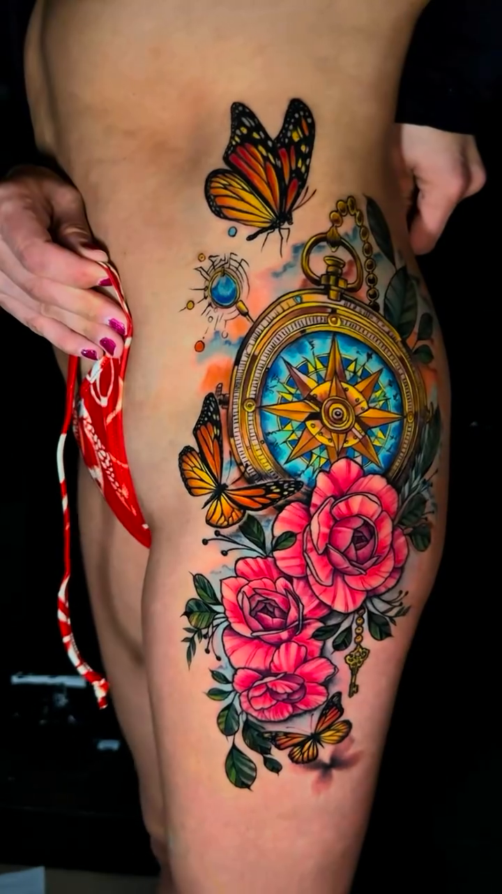 Compass with roses and butterflies neo-traditional tattoo by Omar Sheriff Herrera
