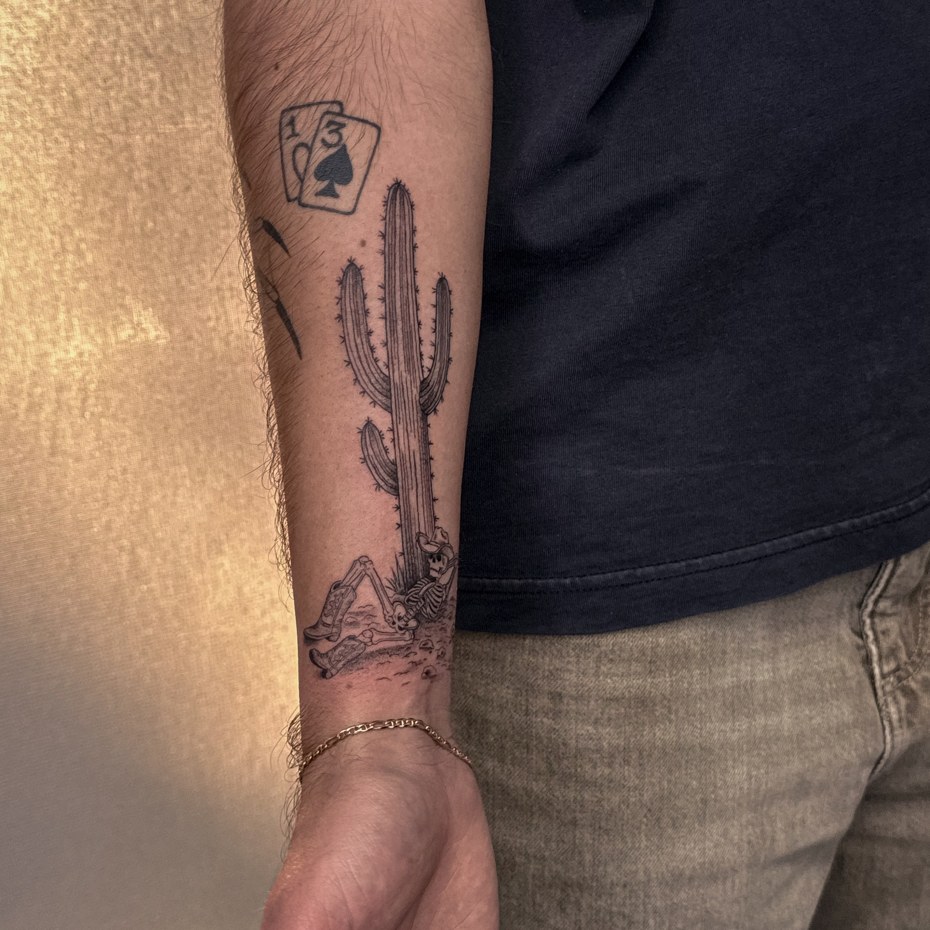 Cactus and skeleton realism tattoo on the forearm by Las Vegas Tattoo Artist