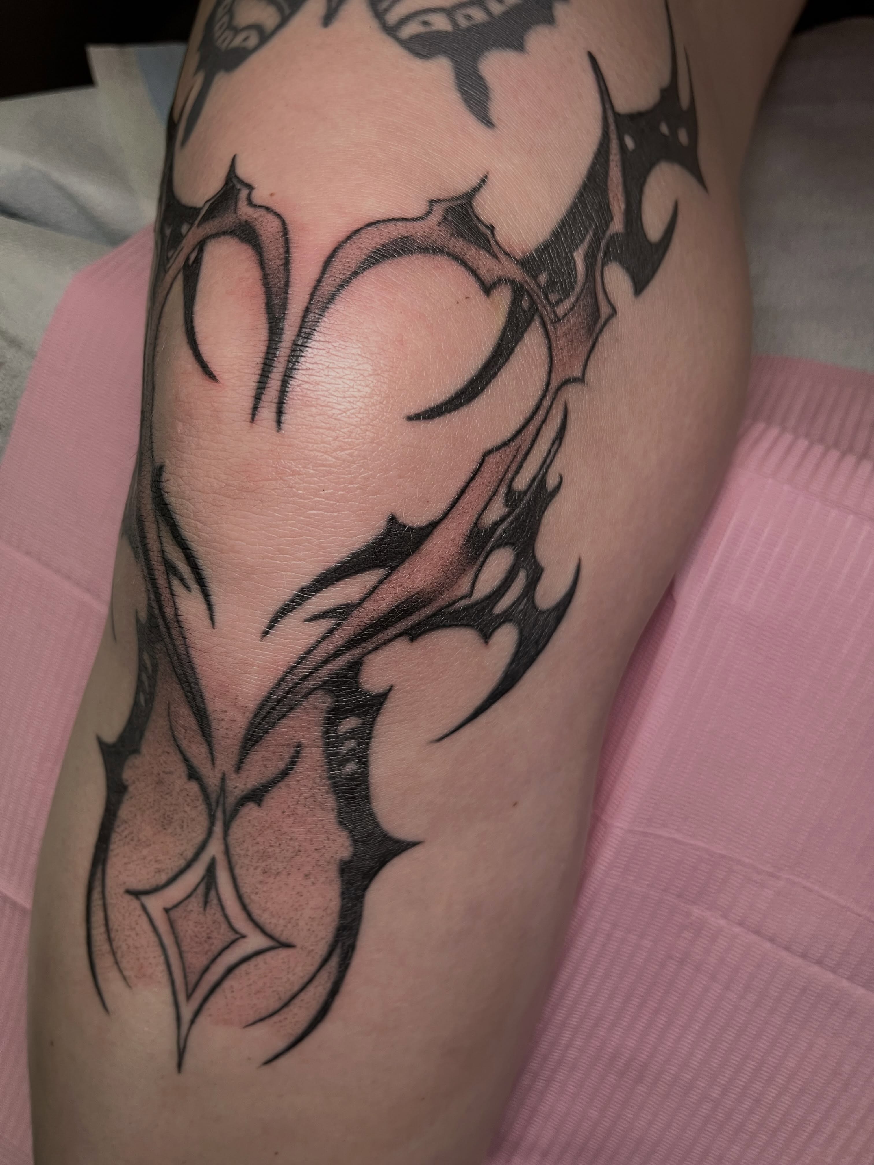 Tribal heart tribal tattoo on the forearm by Hannah Hahn
