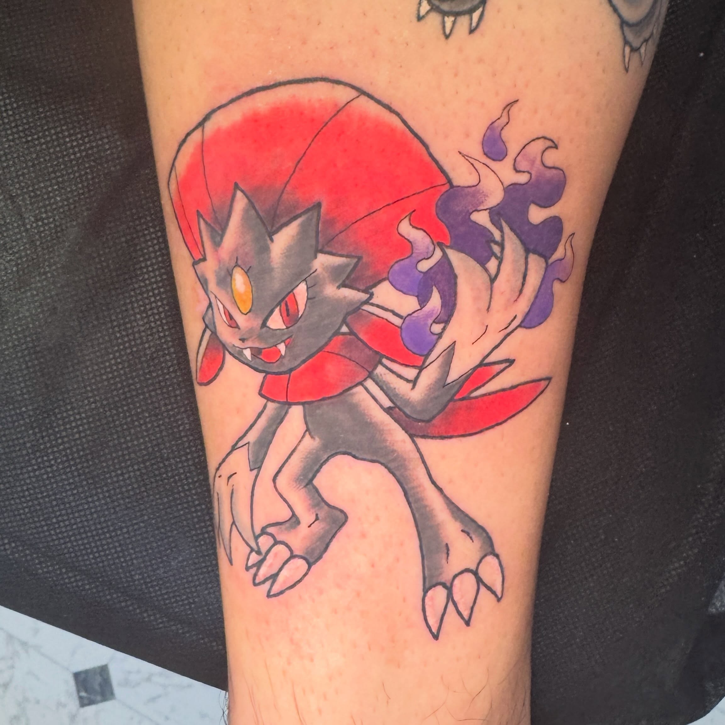 Moltres anime tattoo on the forearm by Zac Smith-Chevalier