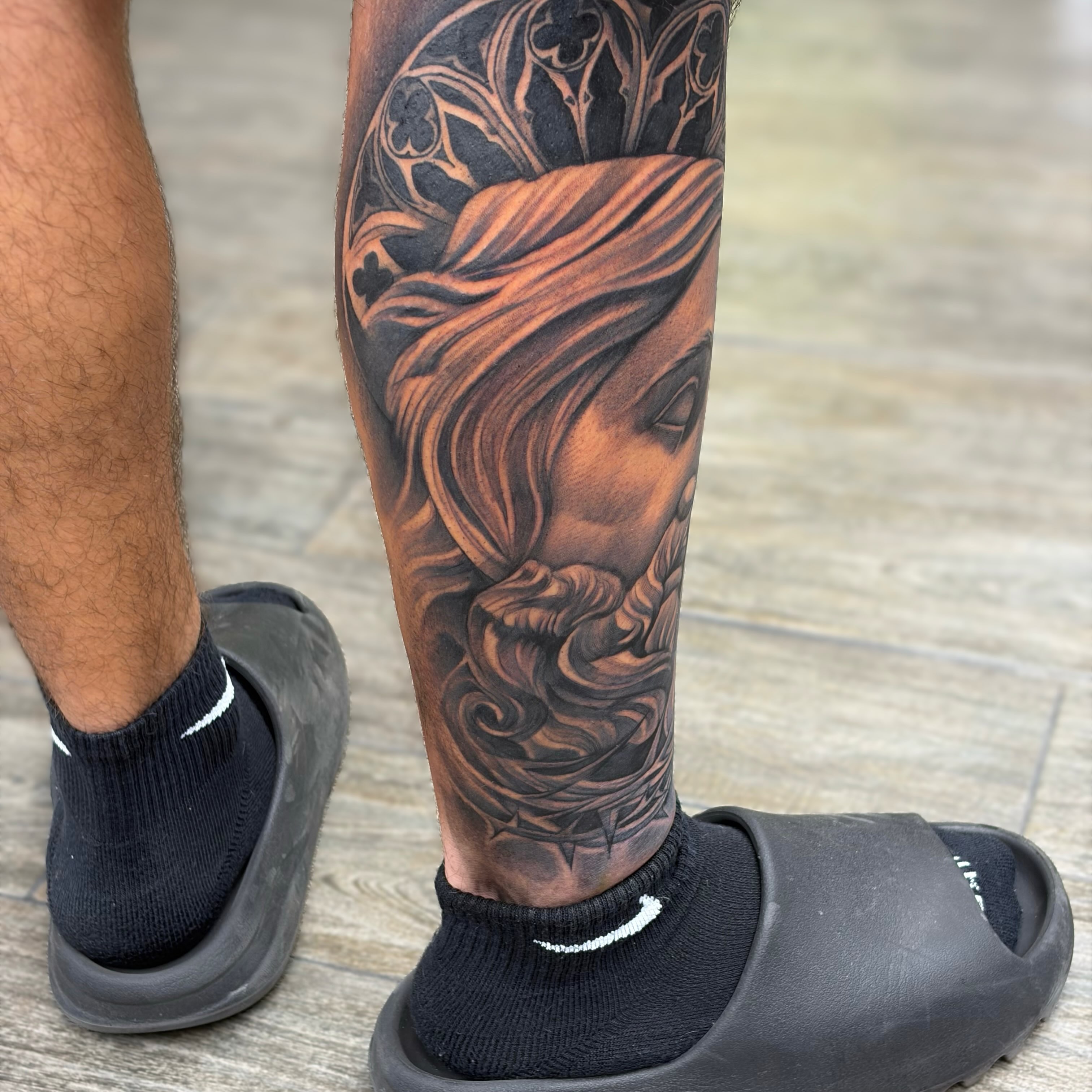Bearded man realism tattoo on the calf by Dallas Tattoo Artist