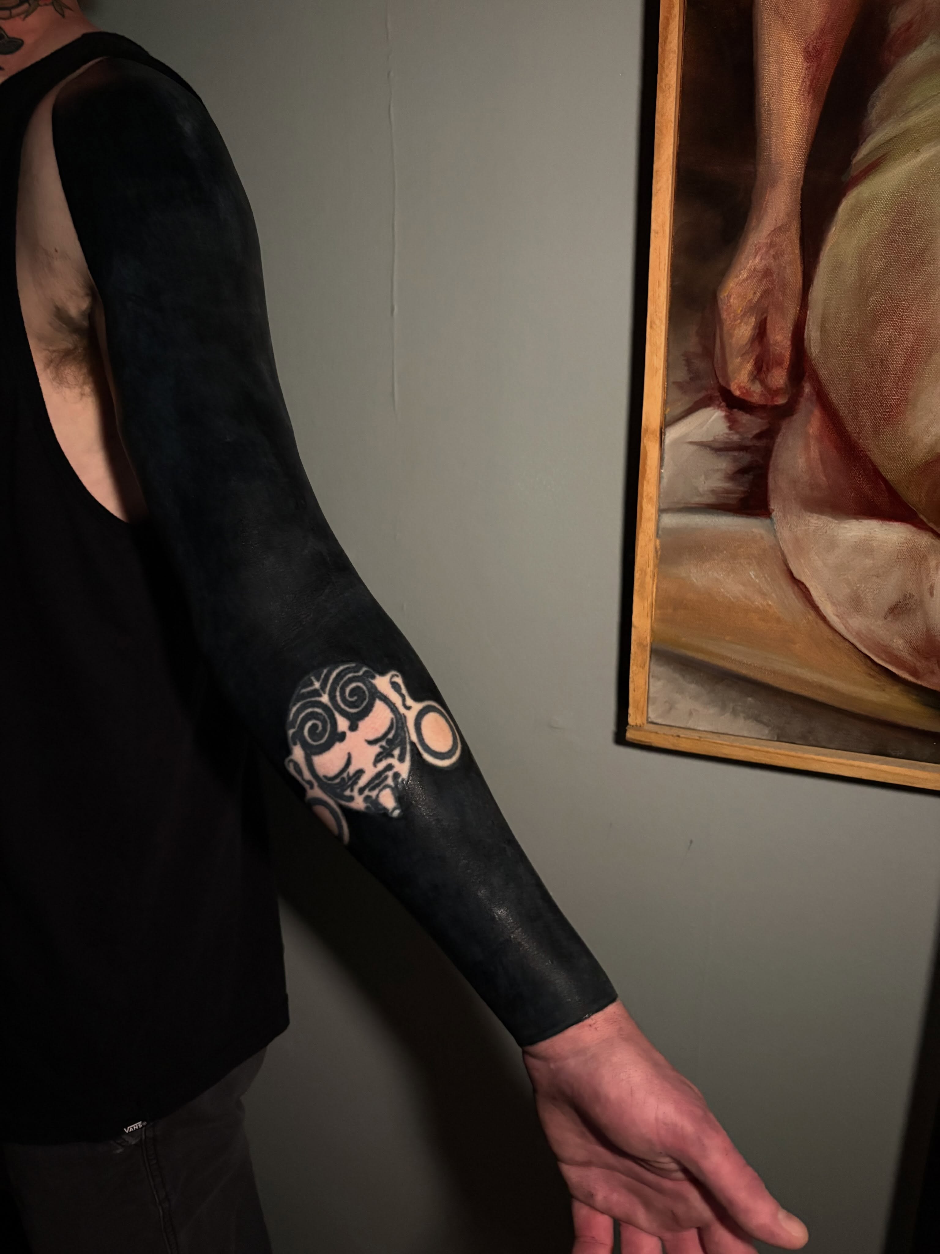 Astronaut black and grey tattoo on the forearm by Cameron Scofield