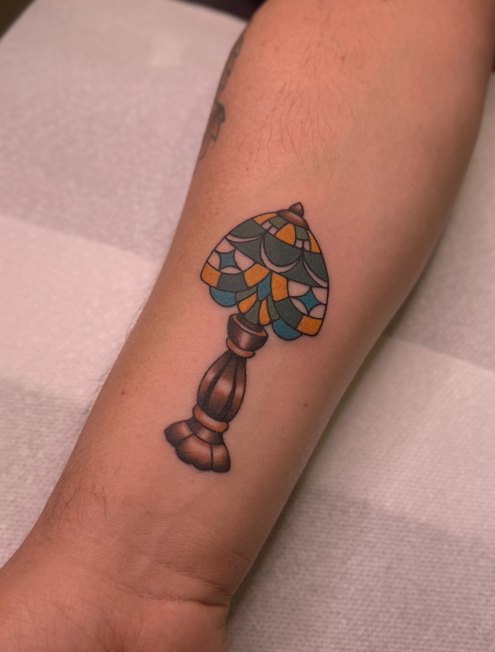 Lampshade geometric tattoo on the forearm by Ethan, Toledo, Ohio