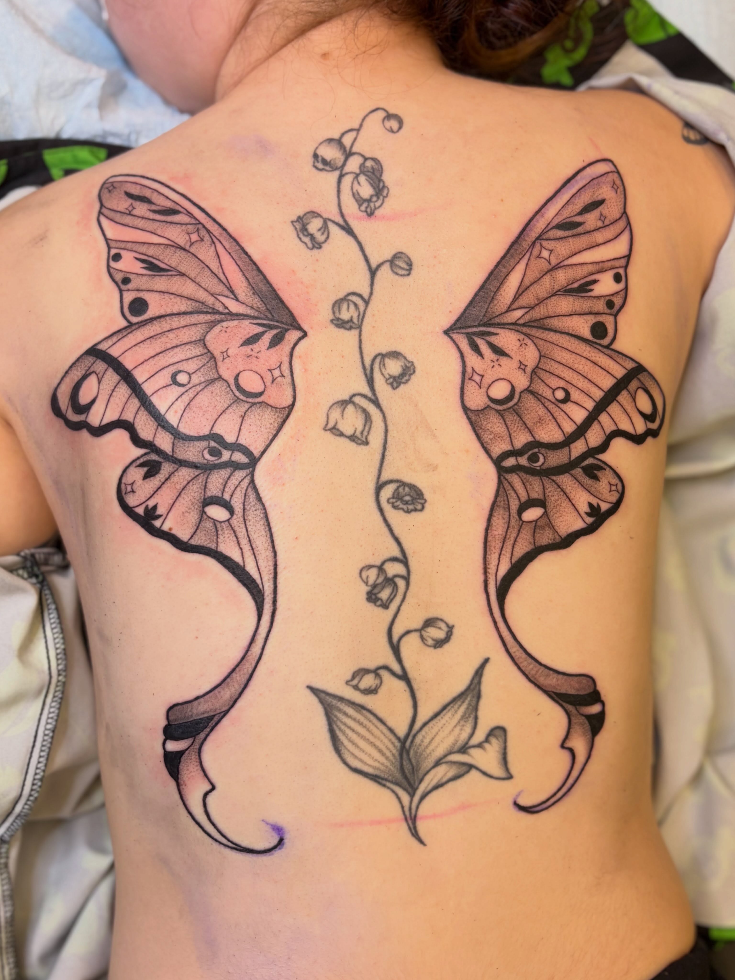 Butterflies and lilies of the valley dotwork tattoo on the back by 🌸Lilac🌸