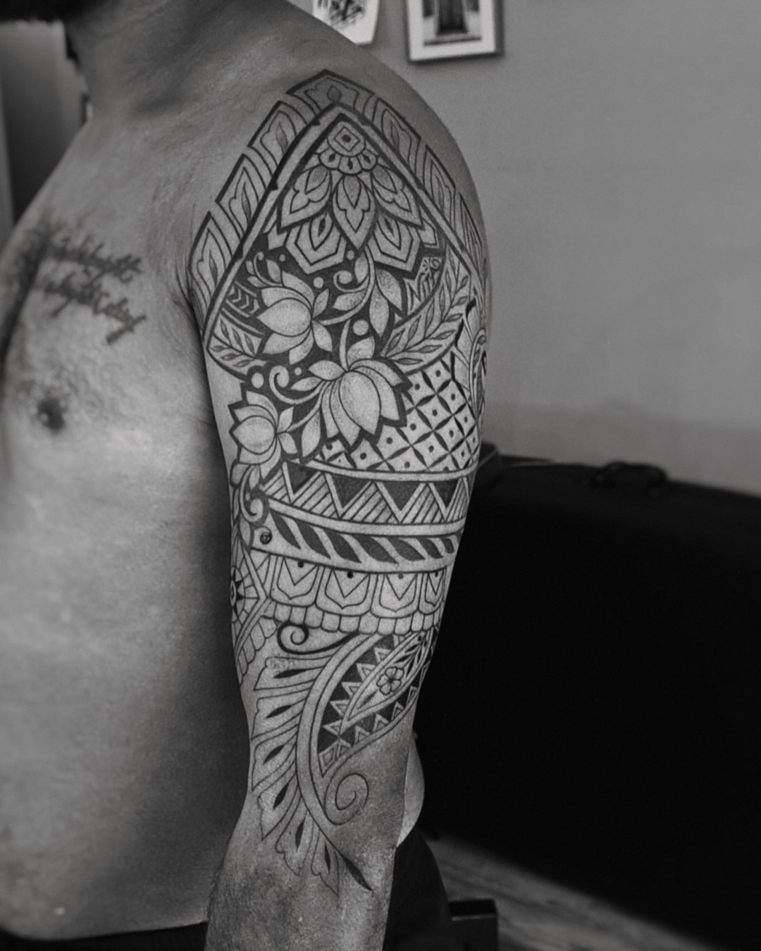 Floral mandala ornamental tattoo on the upper arm by Sabreena Haque