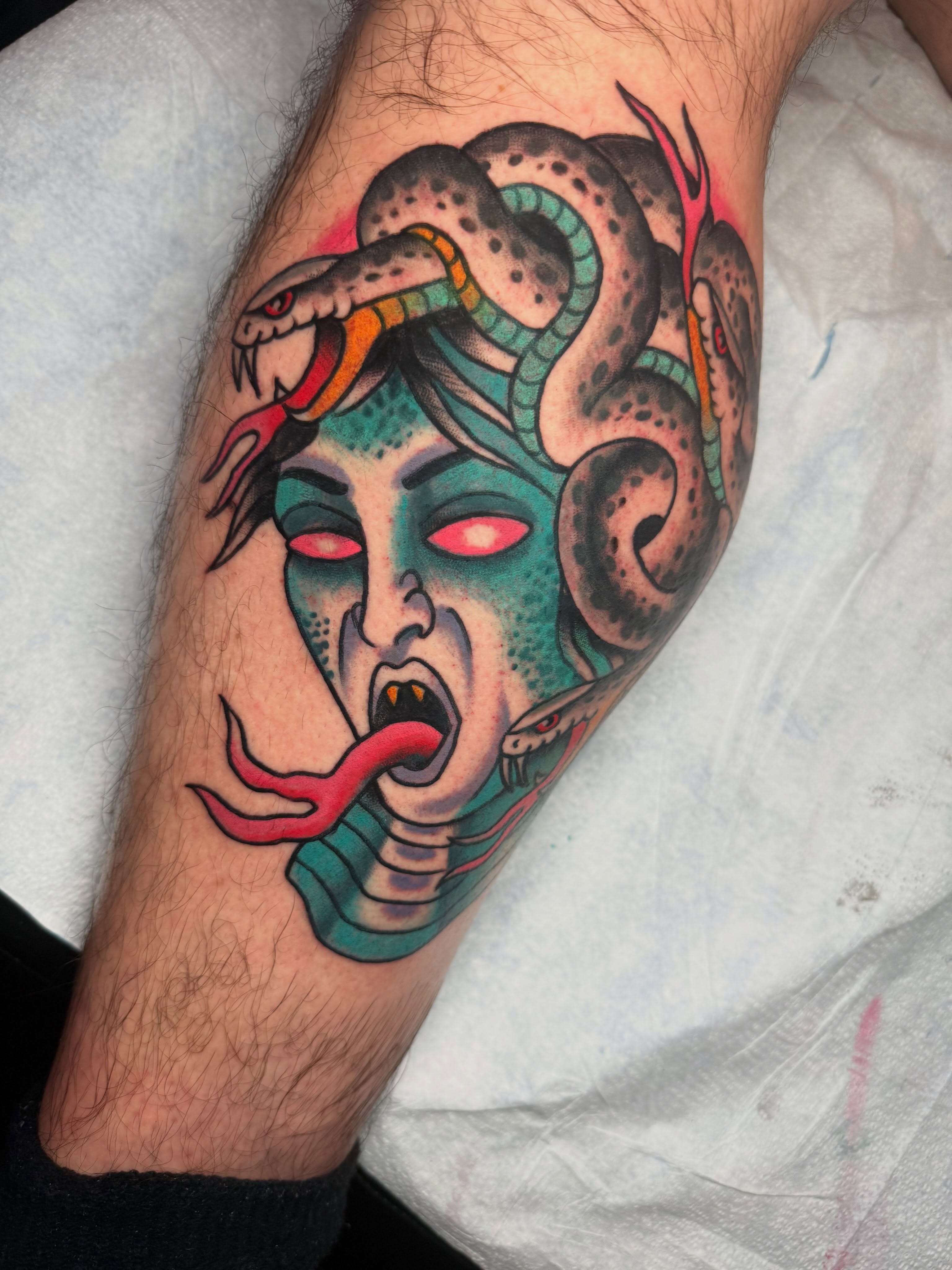 Medusa American traditional tattoo on the forearm by Chris Bishop