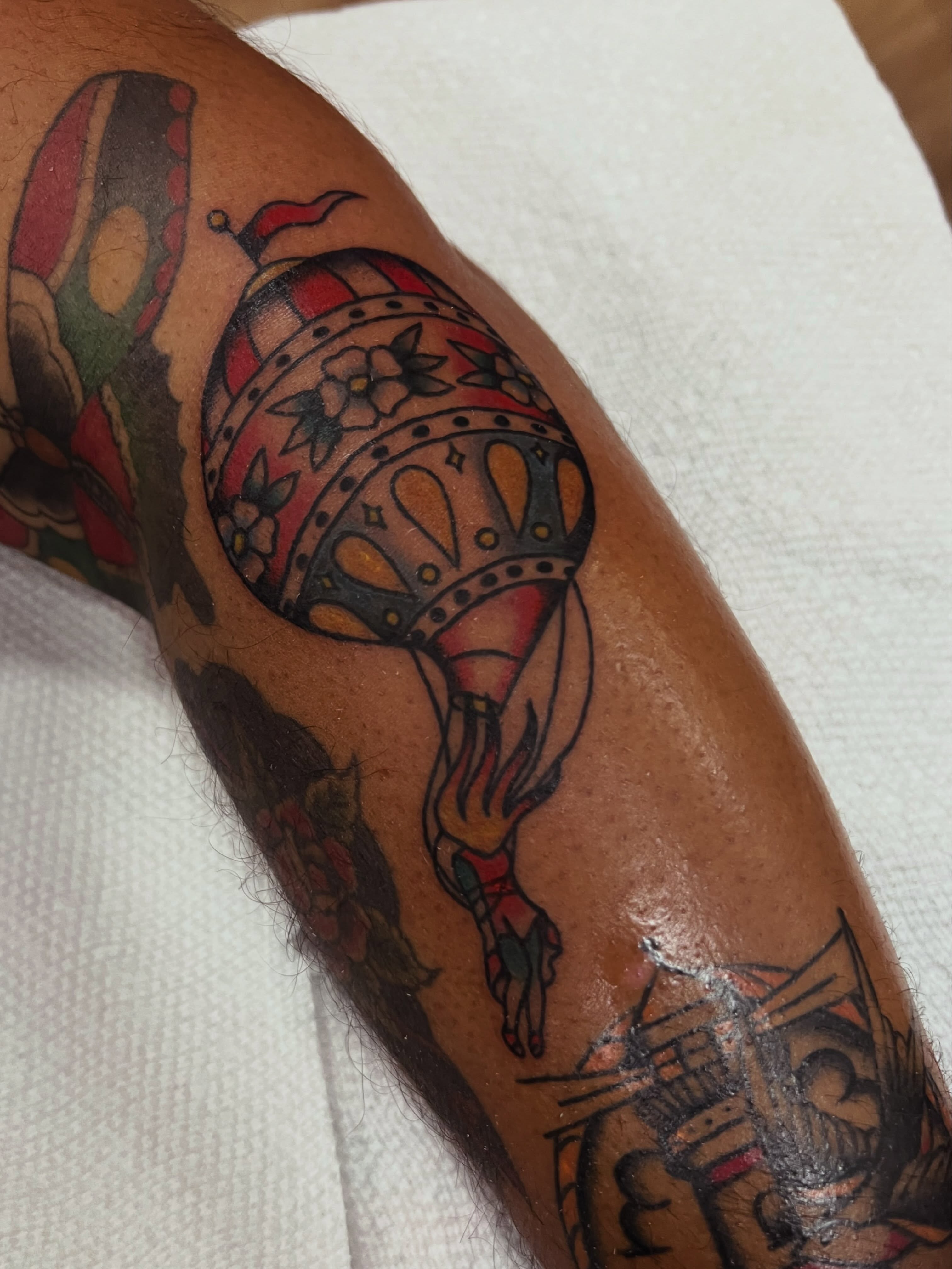 Balloon American traditional tattoo on the forearm by Samantha Citer