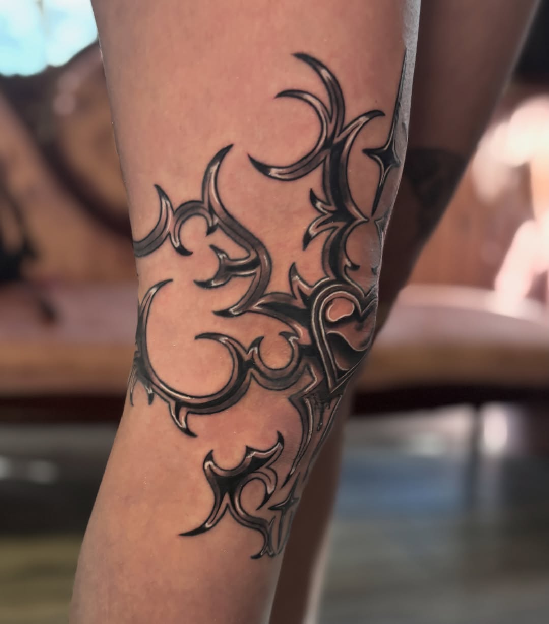 Tribal design tribal tattoo on the forearm by Bekah Smith