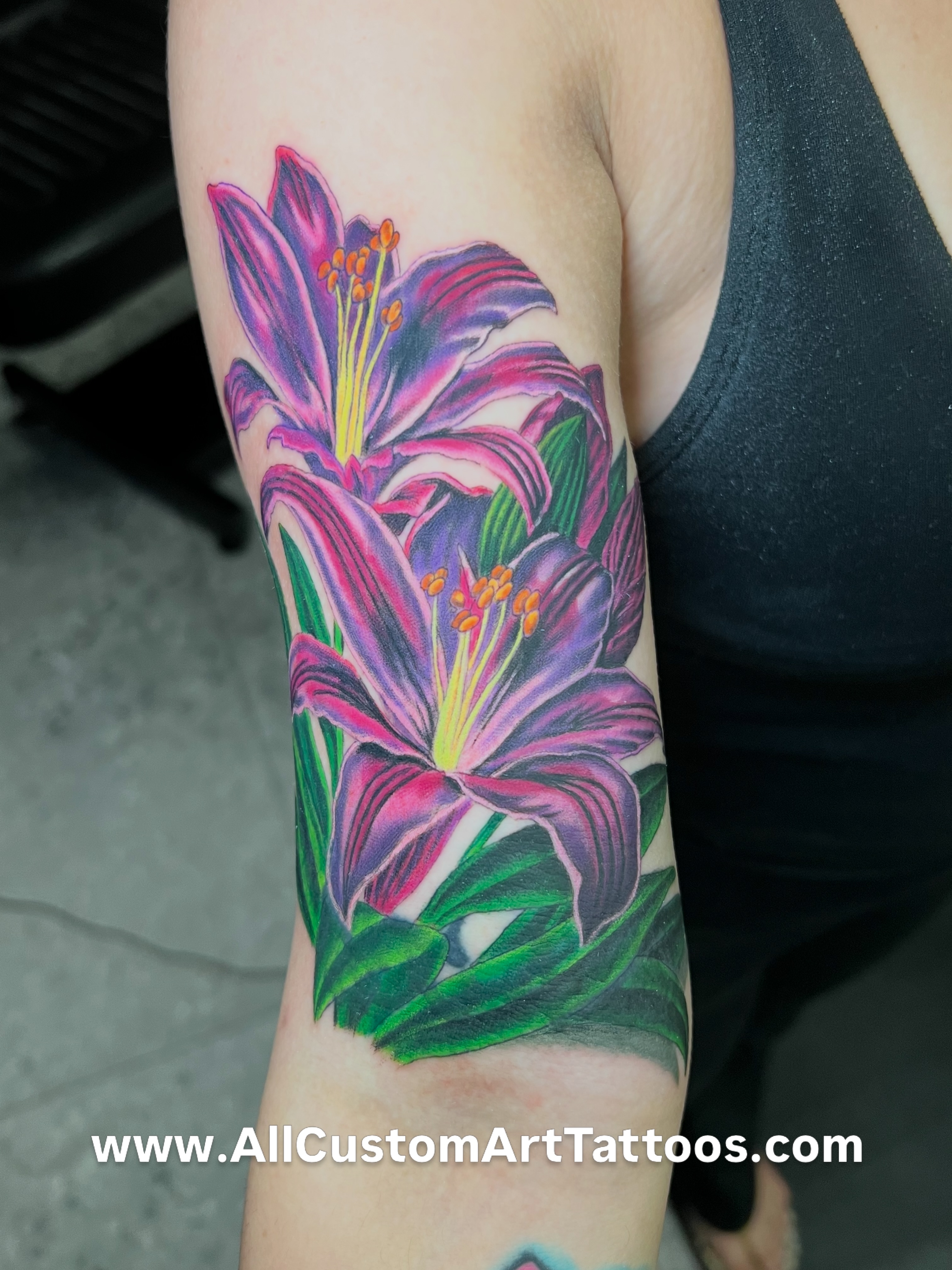 Lilies realism tattoo on the forearm by Rafael Marte, White Plains, New York