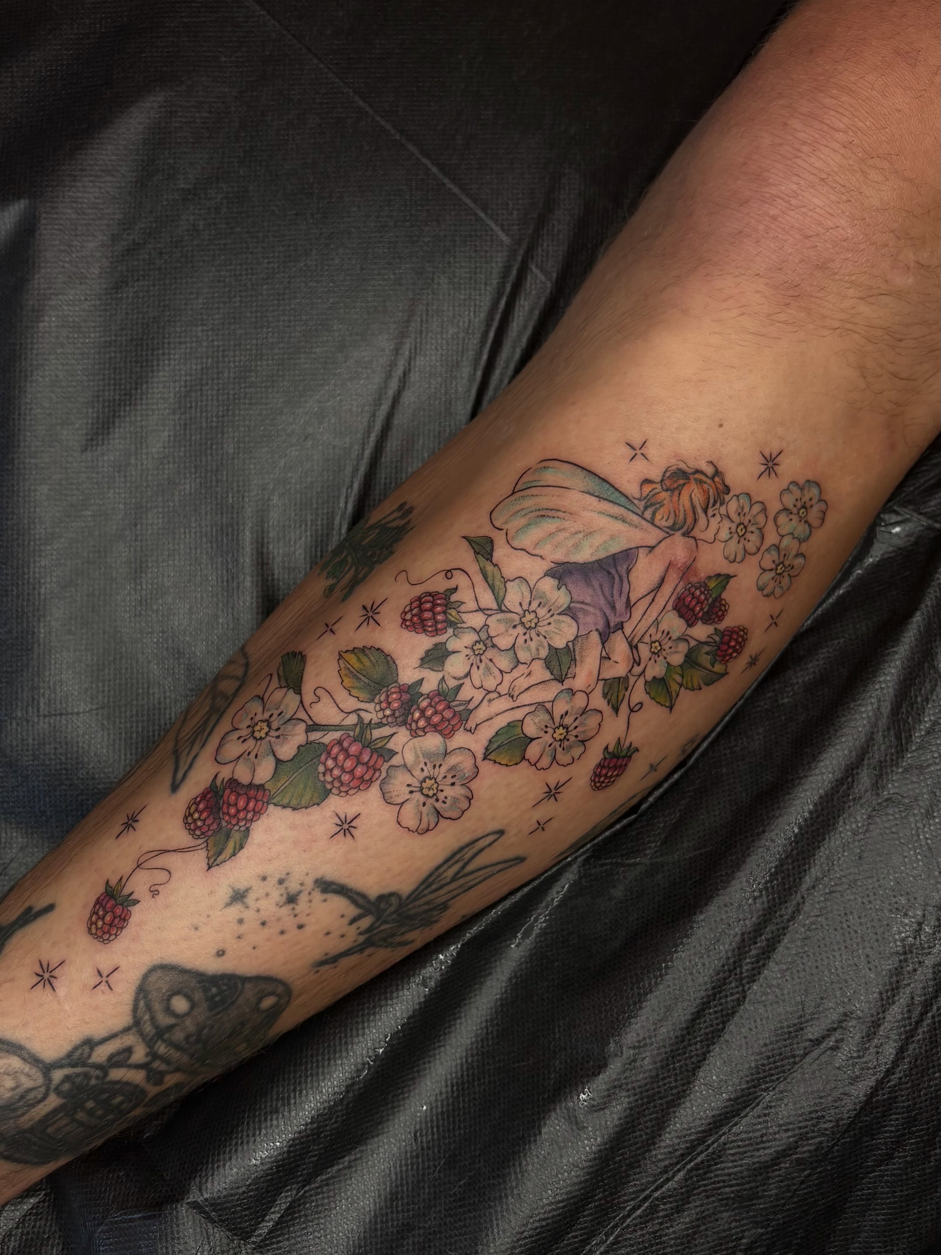 Fairy and floral new school tattoo on the forearm by emery ♡ slc utah tattoo artist