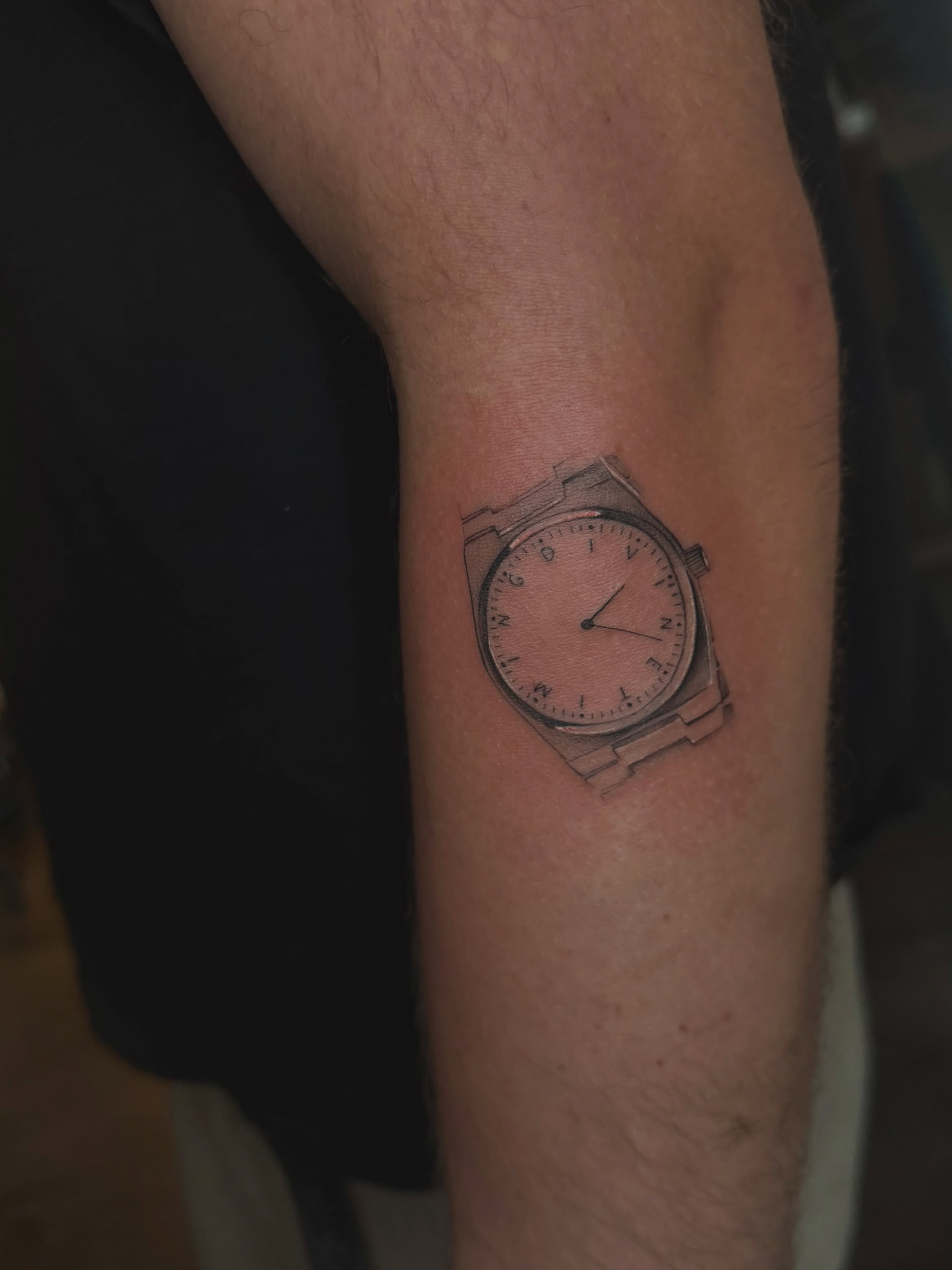 Watch black and grey tattoo on the forearm by Lily Cuoio~ Seattle