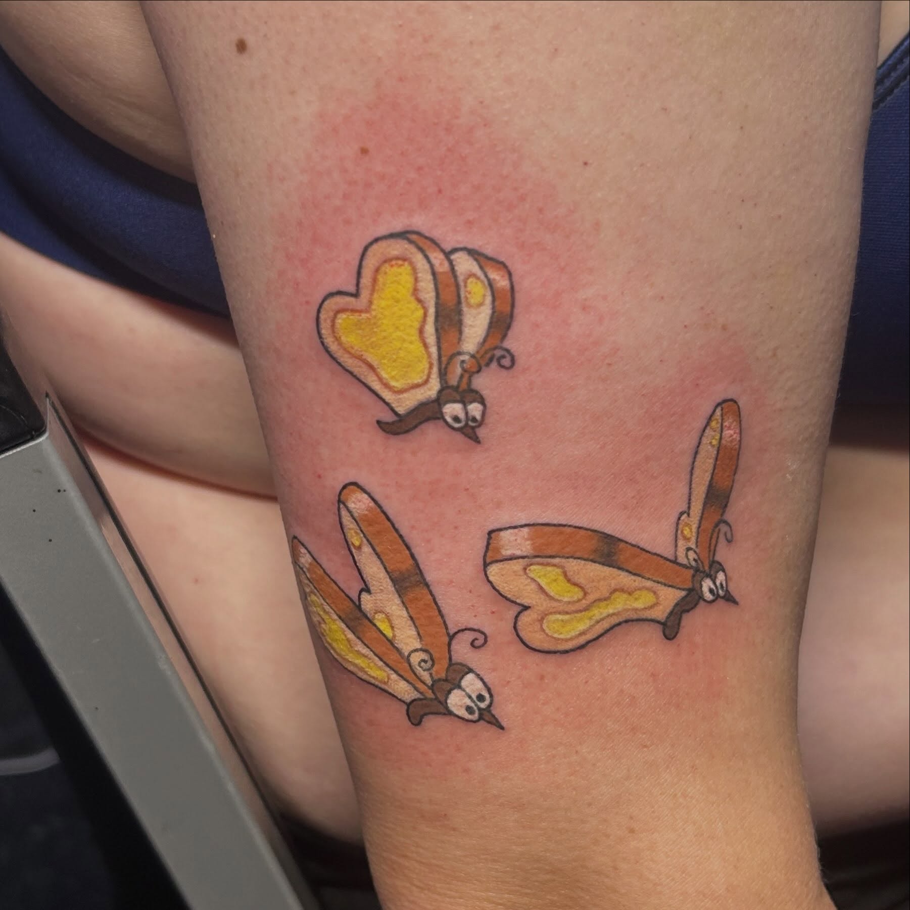 Butterfly new school tattoo on the forearm by Jamie Winn