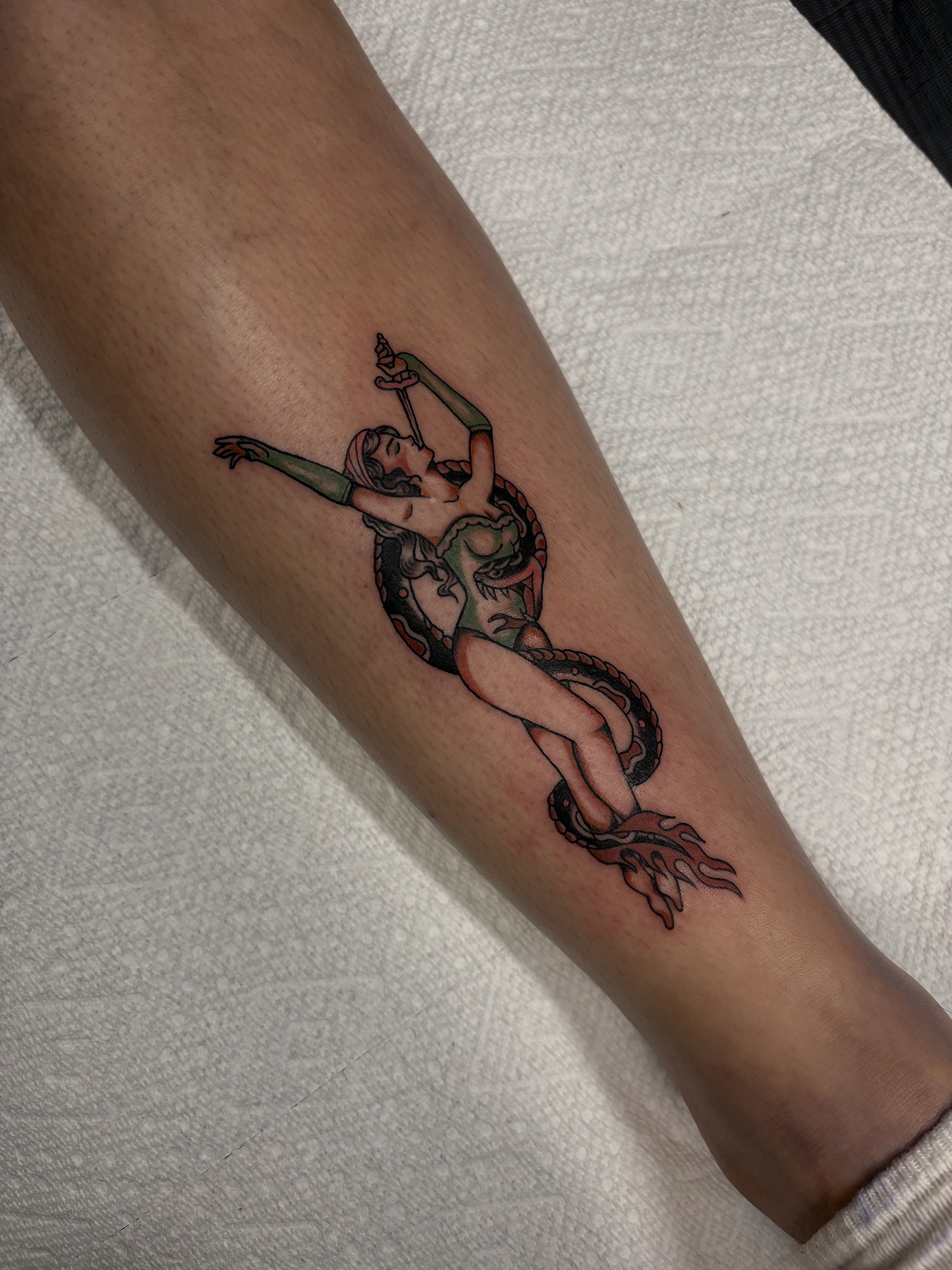 Mermaid with snake American traditional tattoo on the forearm by Genevieve Ehlers, Denver, Colorado