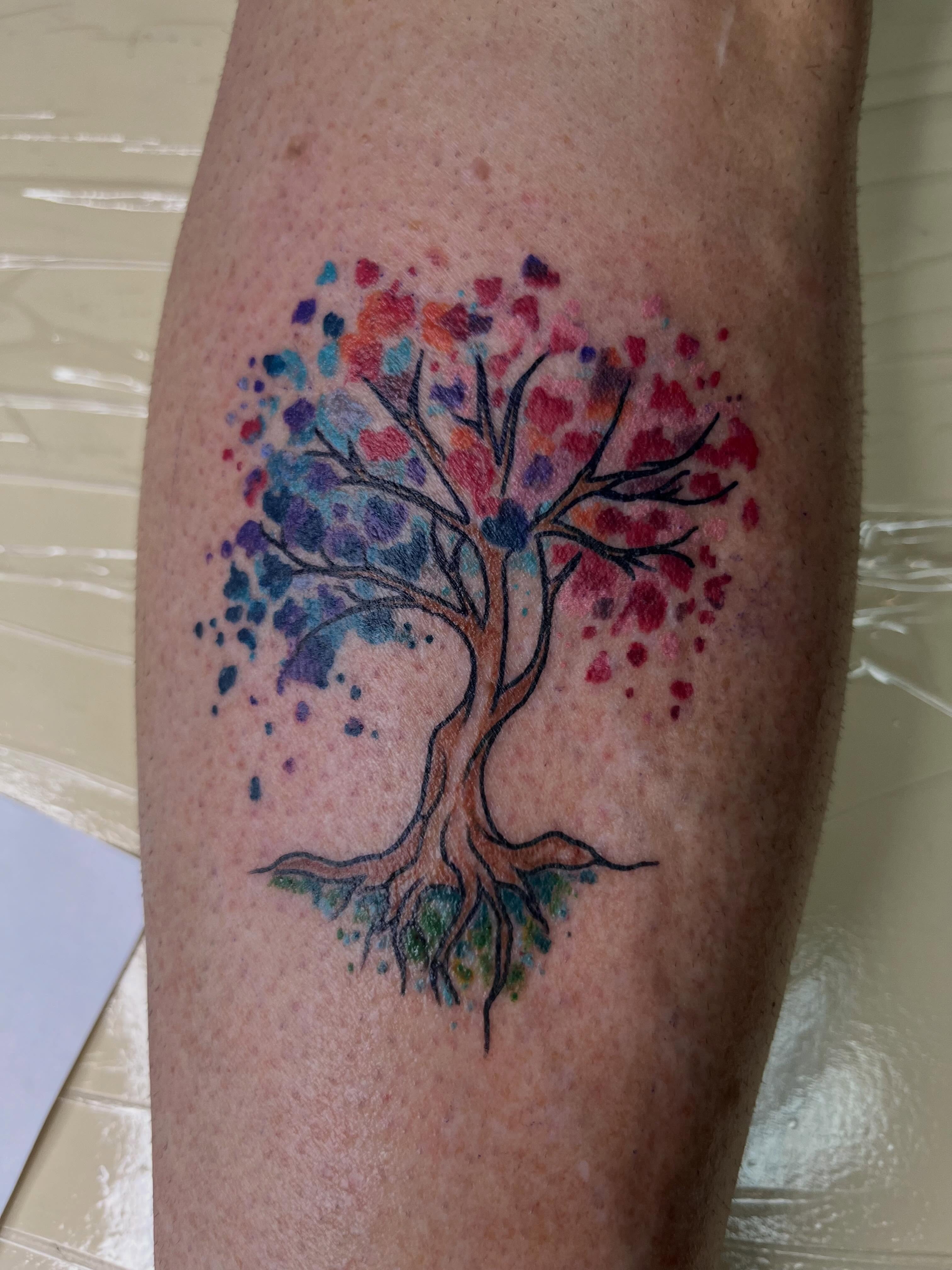 Watercolor tree dotwork tattoo on the forearm by Taya Lynn, Hudson, Wisconsin