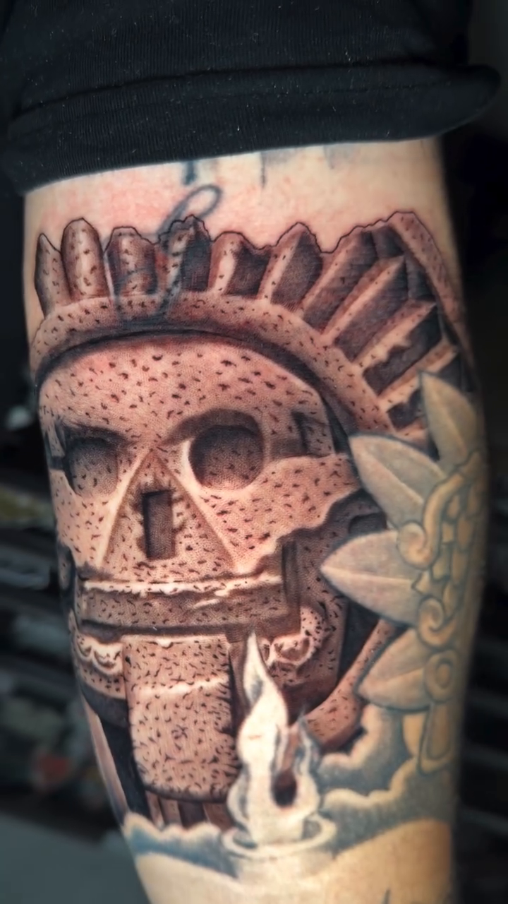 Aztec skull with candle realism tattoo by professional tattoo artist