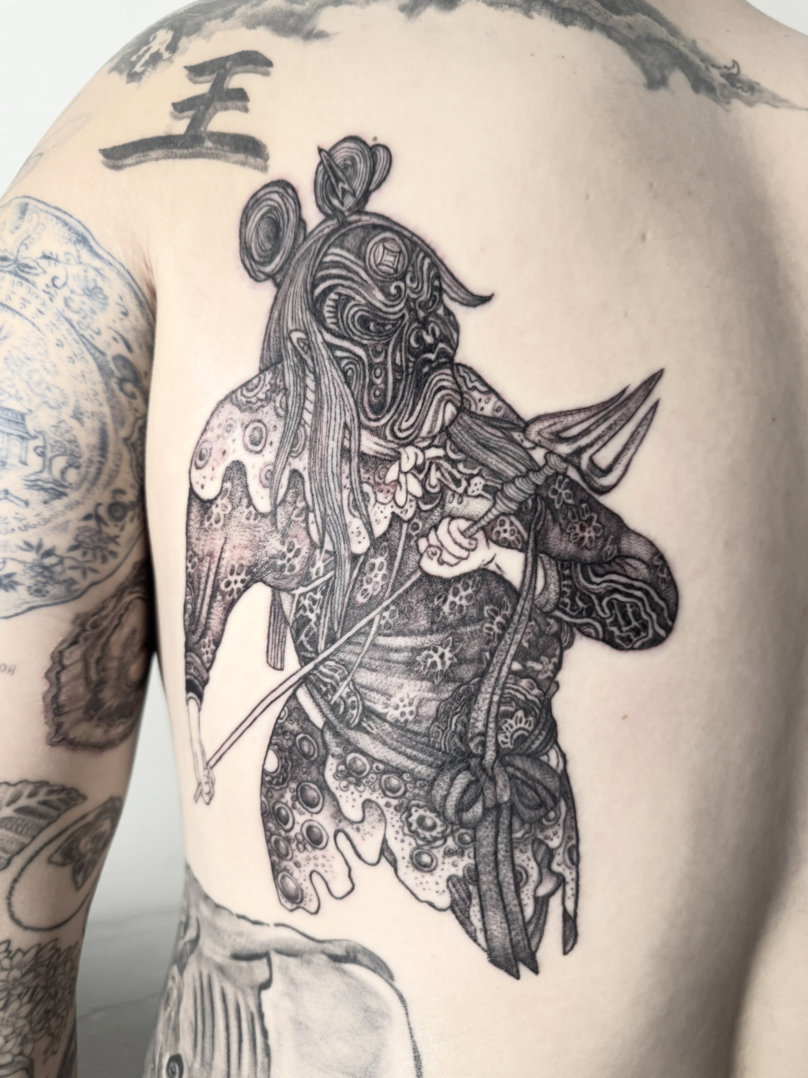 Warrior realism tattoo on the shoulder by Tianna Osborne