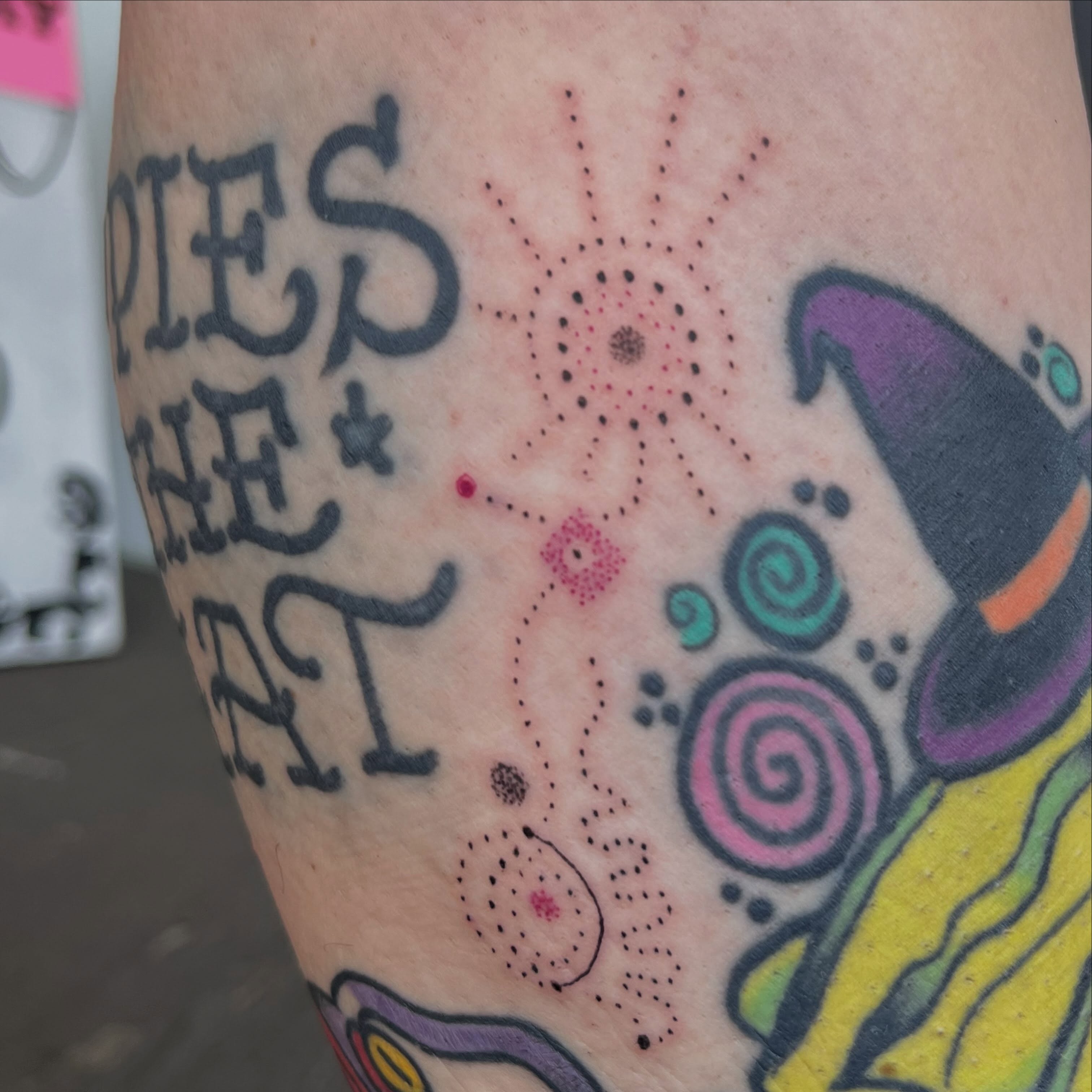 Pie and wizard dotwork tattoo on the forearm by Vincent Espinoza, Eugene, Oregon