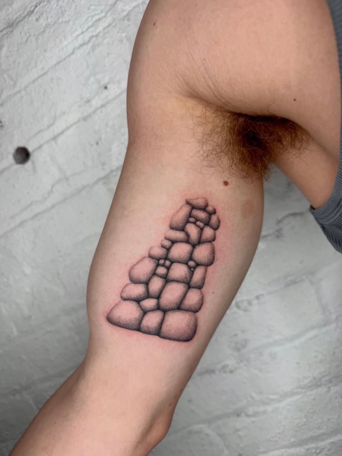Stone wall dotwork tattoo on the forearm by Kenny ๐ด