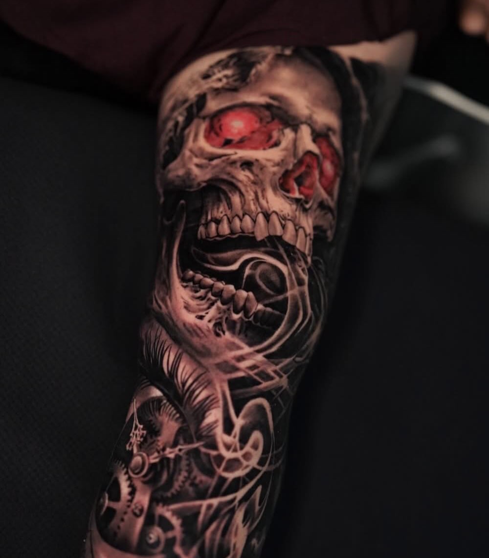 Cyborg skull realism tattoo on the forearm by Elijah Tattoos, San Diego, California