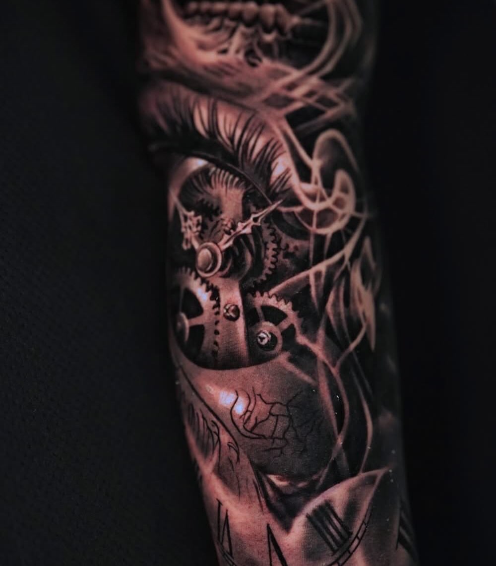 Mechanical heart dark realism tattoo on the forearm by Elijah Tattoos, San Diego, California