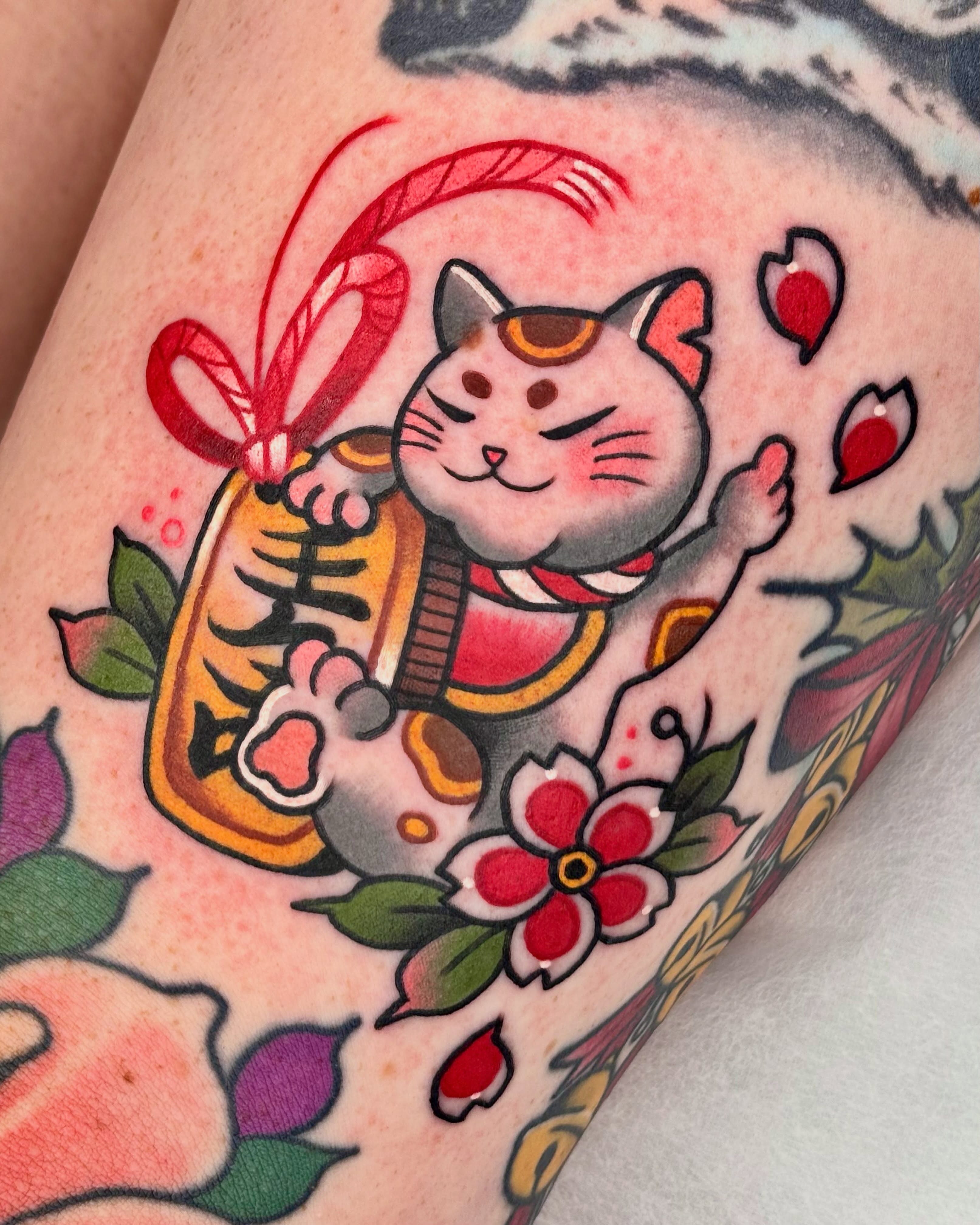 Lucky cat American traditional tattoo on the forearm by 부산타투