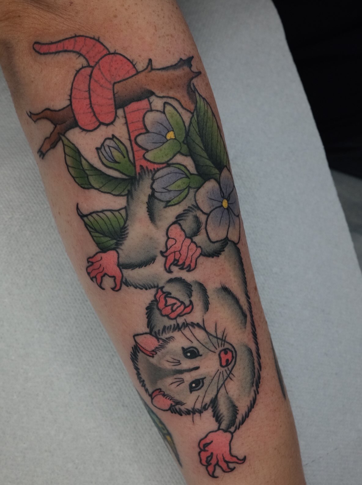 Rats and flowers American traditional tattoo on the forearm by James Maxwell