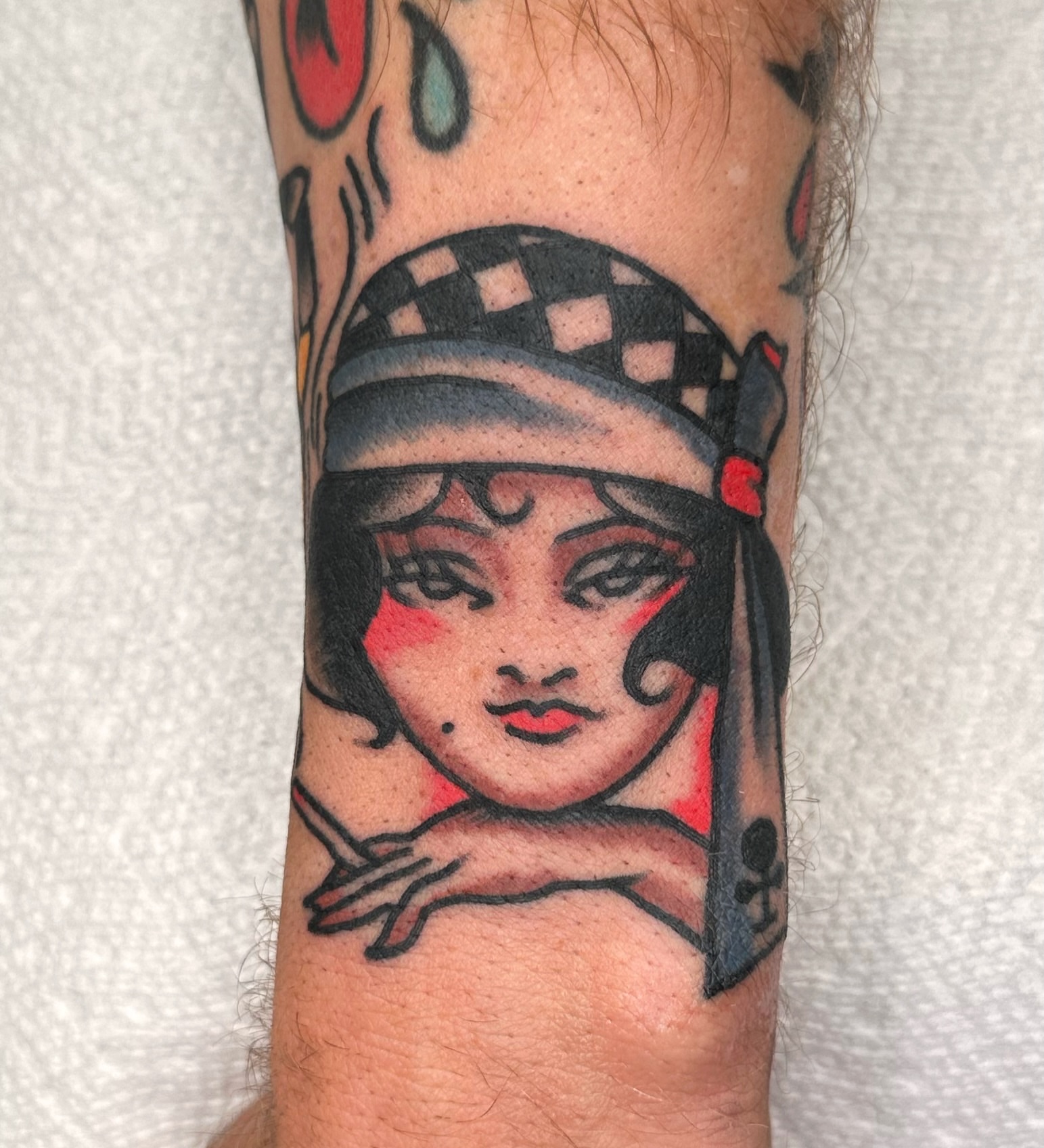 Flapper girl American traditional tattoo on the forearm by Brock Johnson