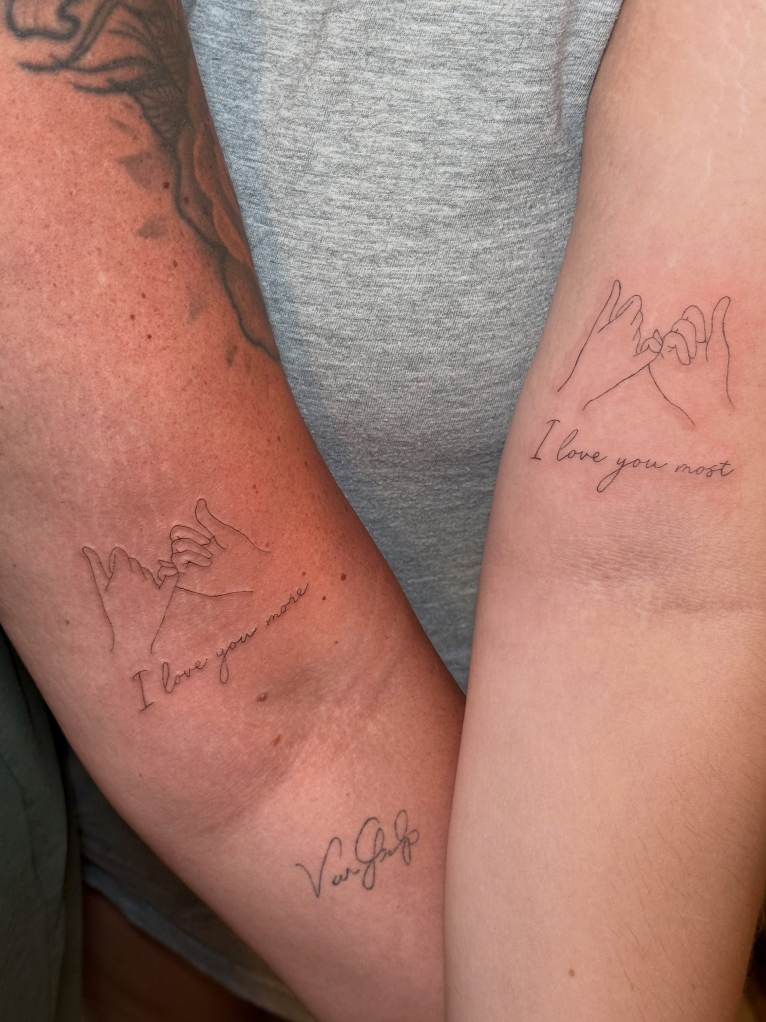 I love you most fine line tattoo on the forearm by Fineline Tattoo
