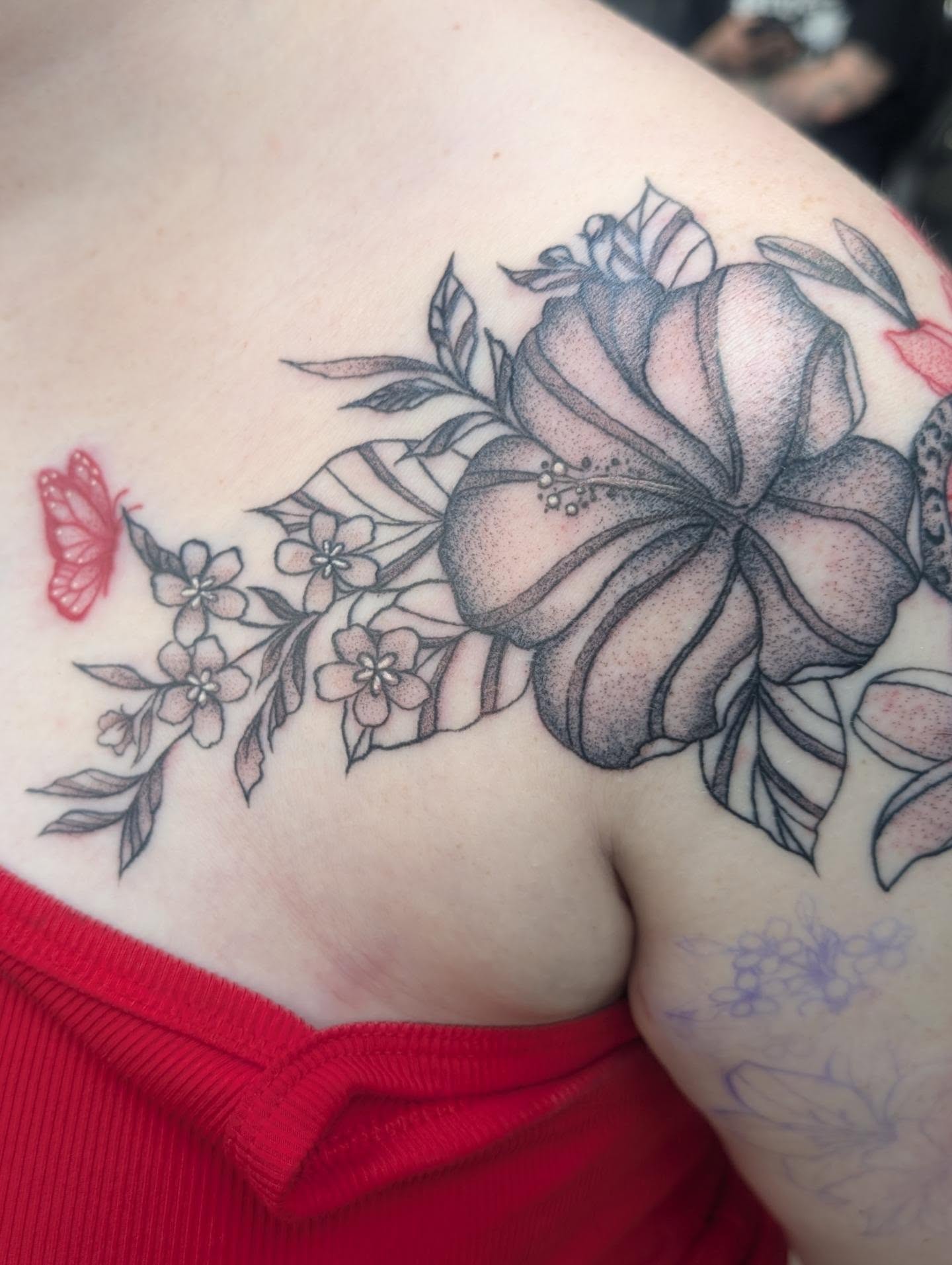 Hibiscus flowers black and grey tattoo on the shoulder by Talia Zula, Loveland, Ohio