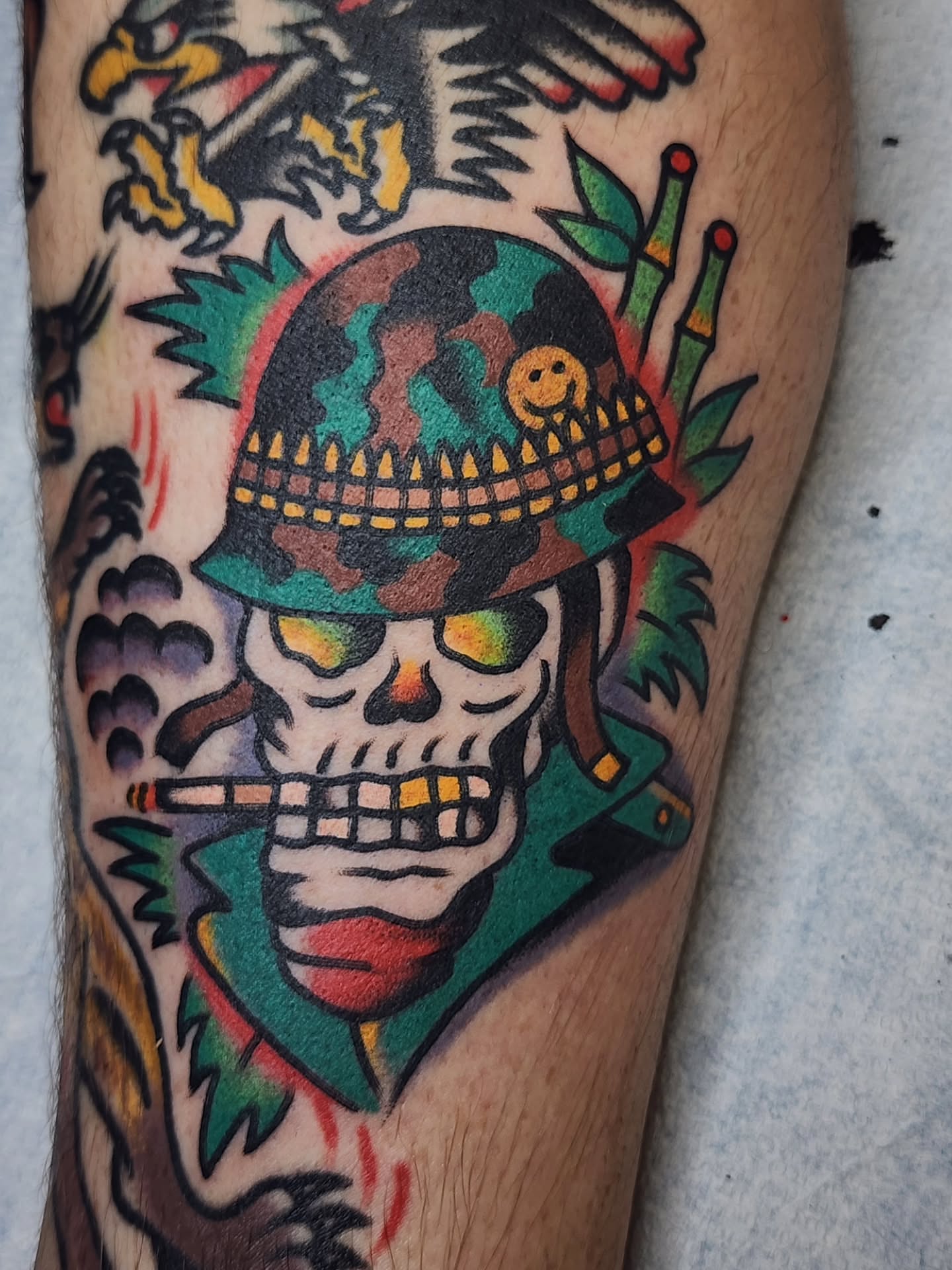 Skull wearing helmet American traditional tattoo on the forearm by πππππ