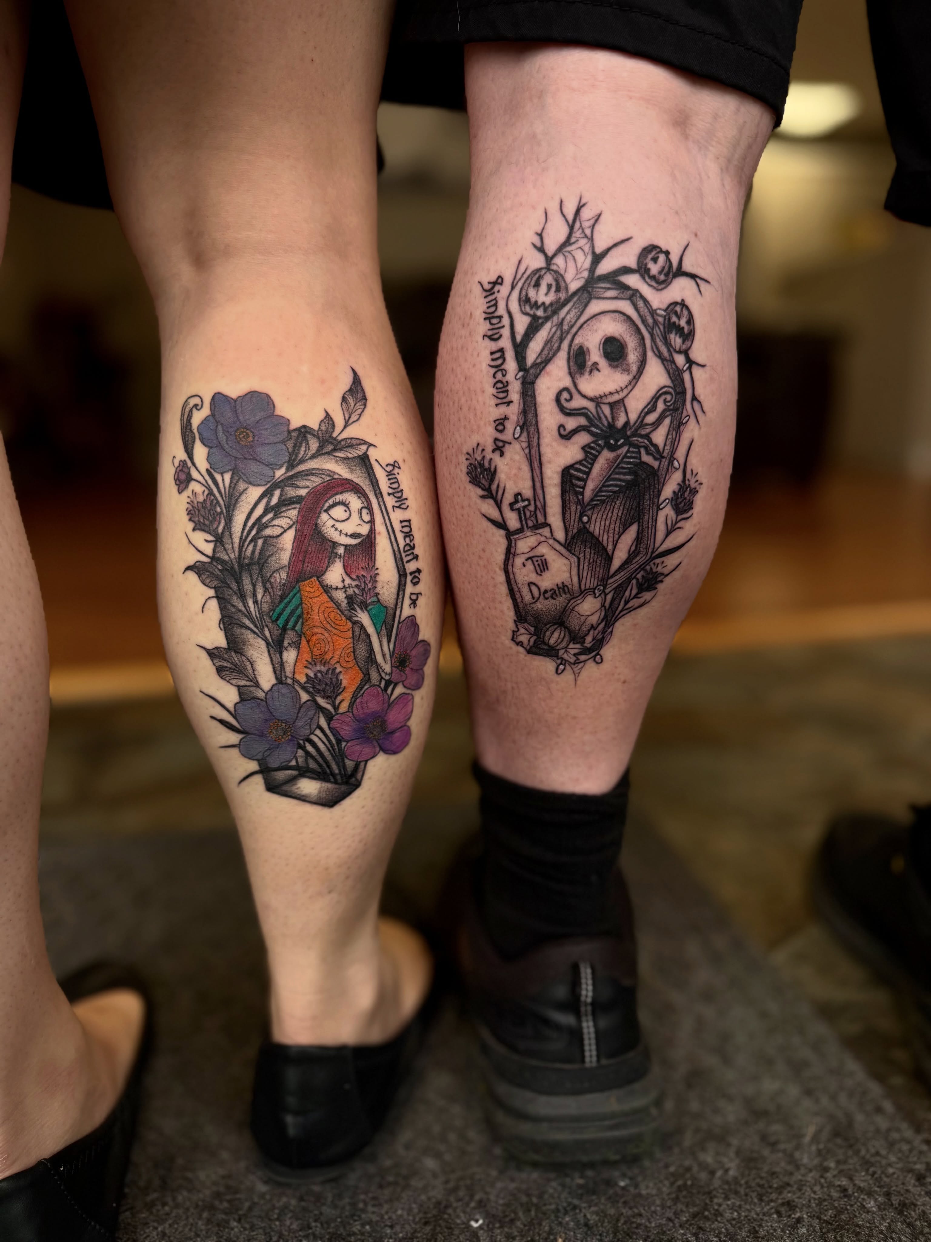 Jack and Sally dark realism tattoo on the calf by Skylar Sheeley