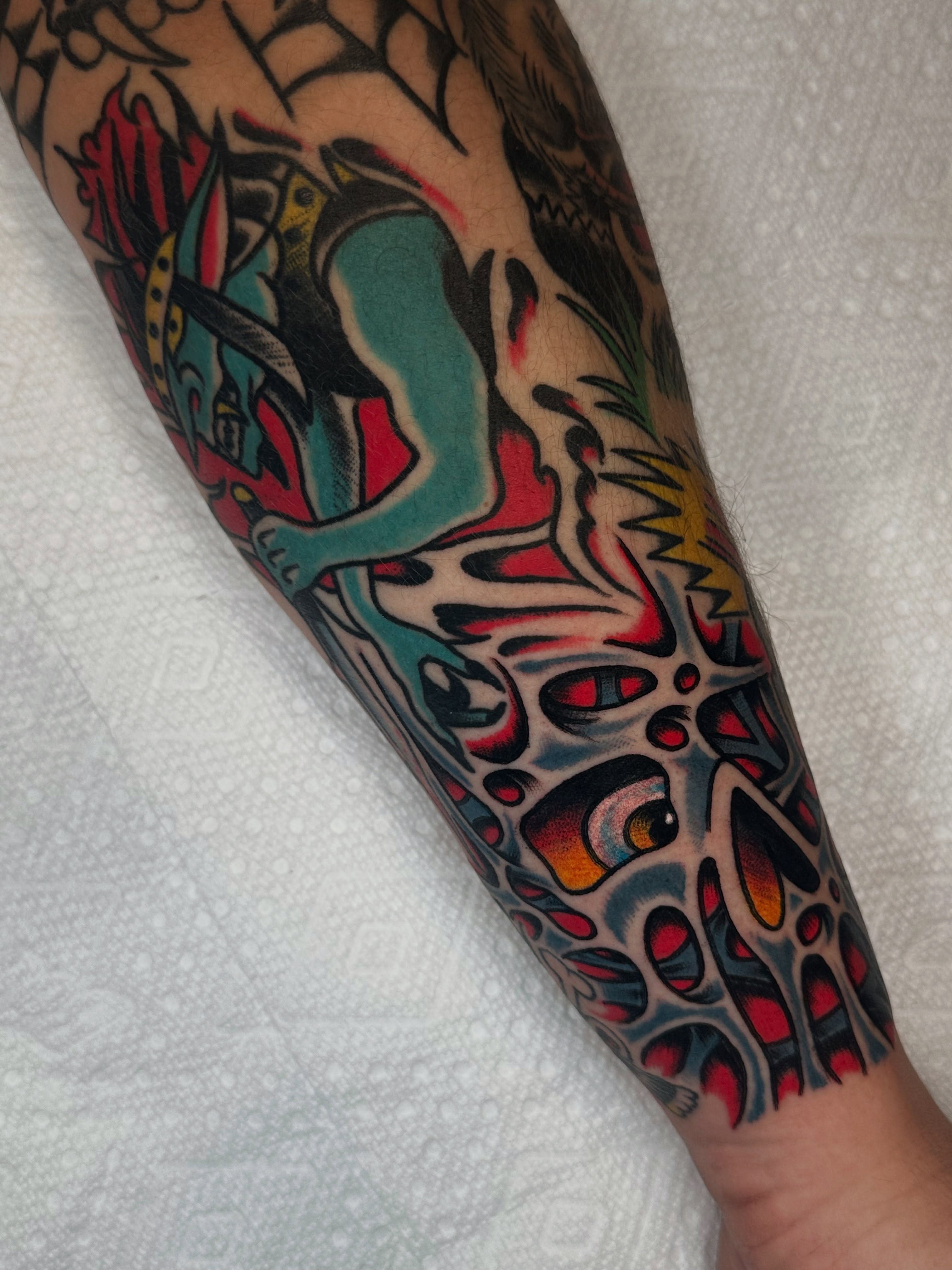Abstract design American traditional tattoo on the forearm by Spencer Crawford, Speedway, Indiana