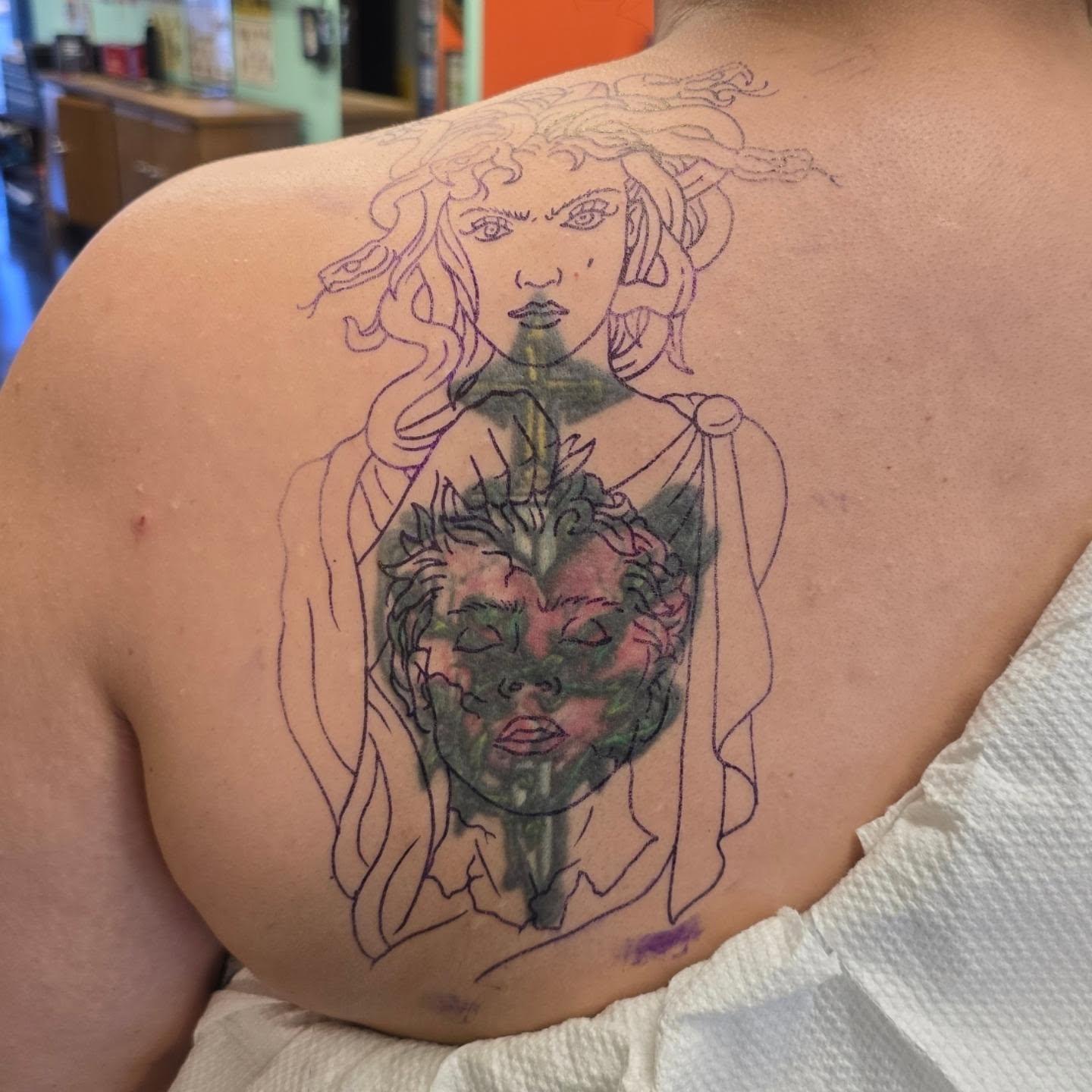 Medusa neo-traditional tattoo on the back by Tattoo Artist, Orange, California