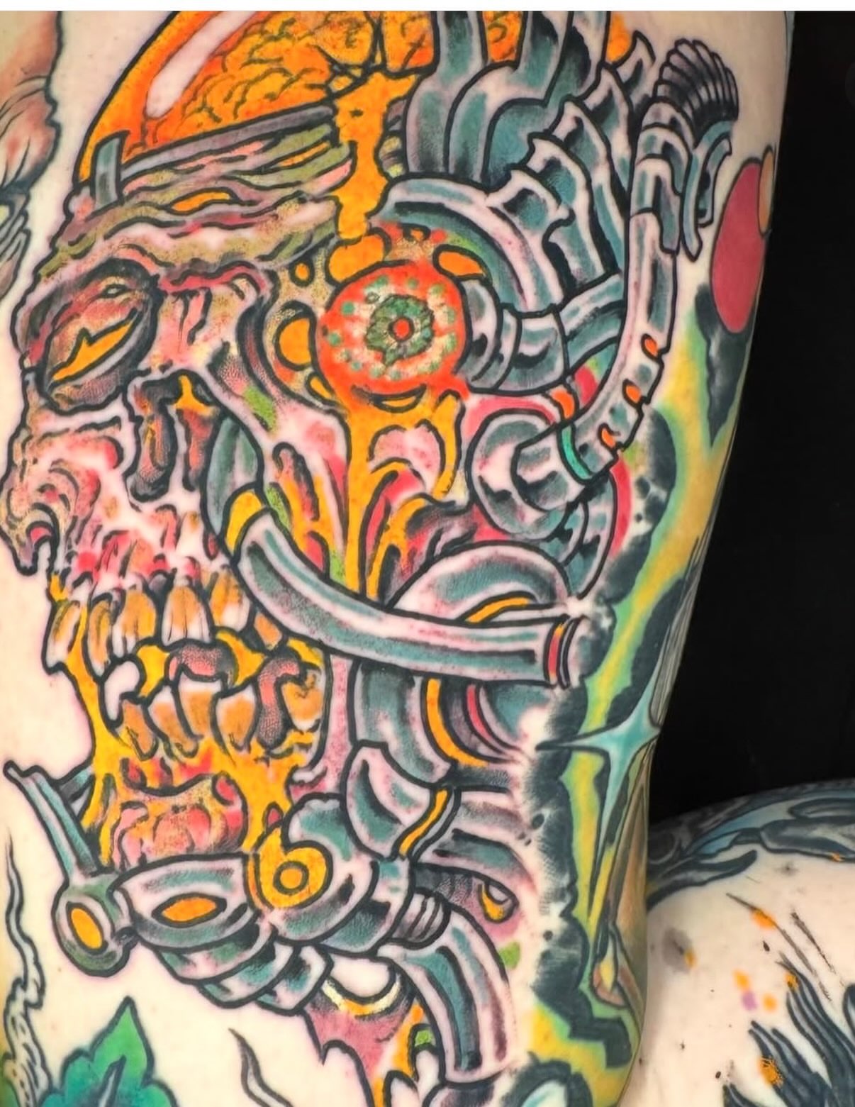 Mechanical skull new school tattoo on the forearm by Tim Lehi, Oakland, California