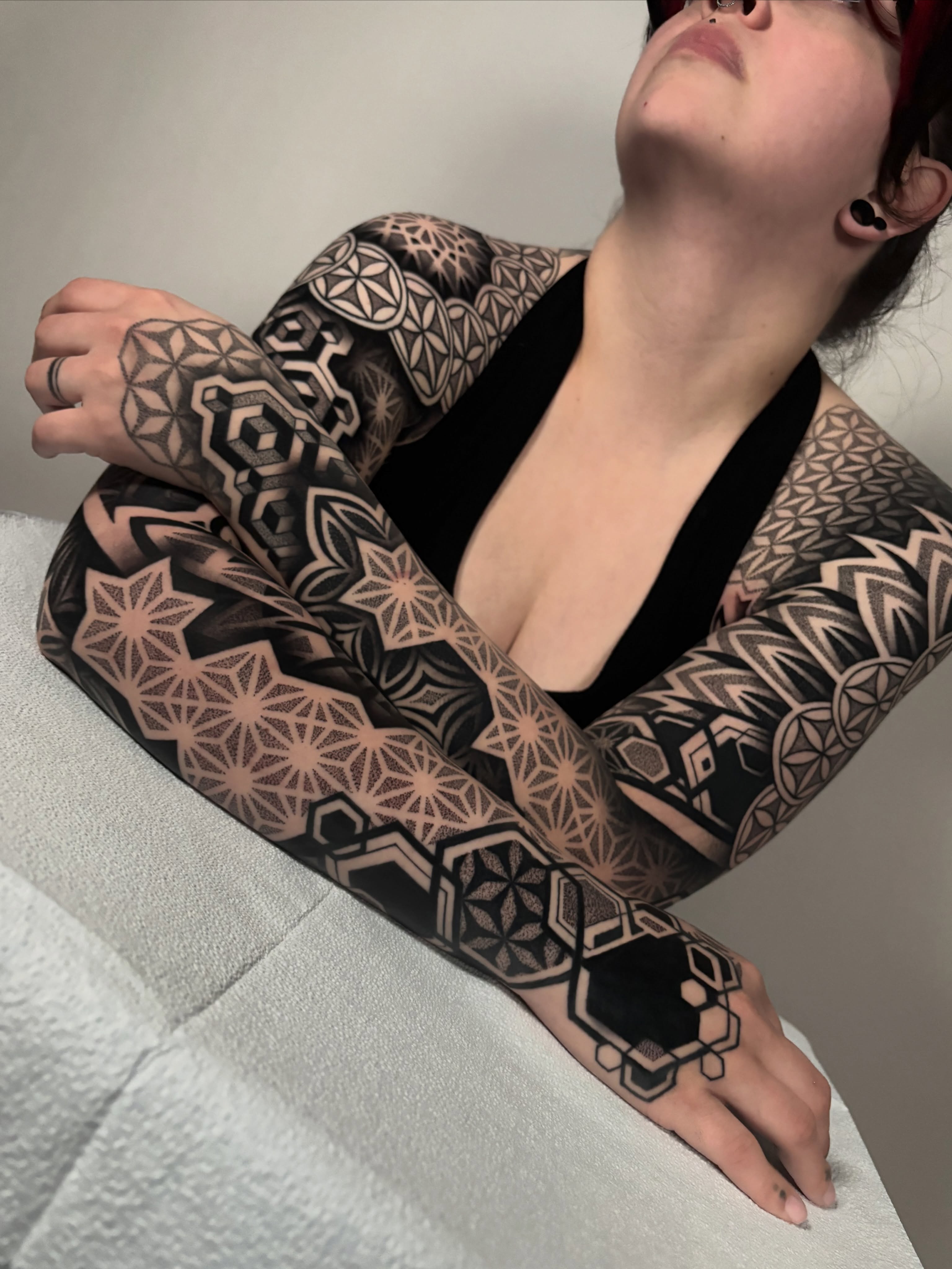 Geometric patterns geometric tattoo on the forearm by Mitch Koch