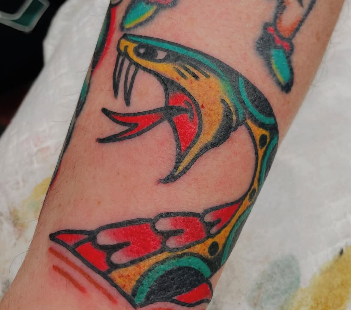 Shark American traditional tattoo on the forearm by dave rash