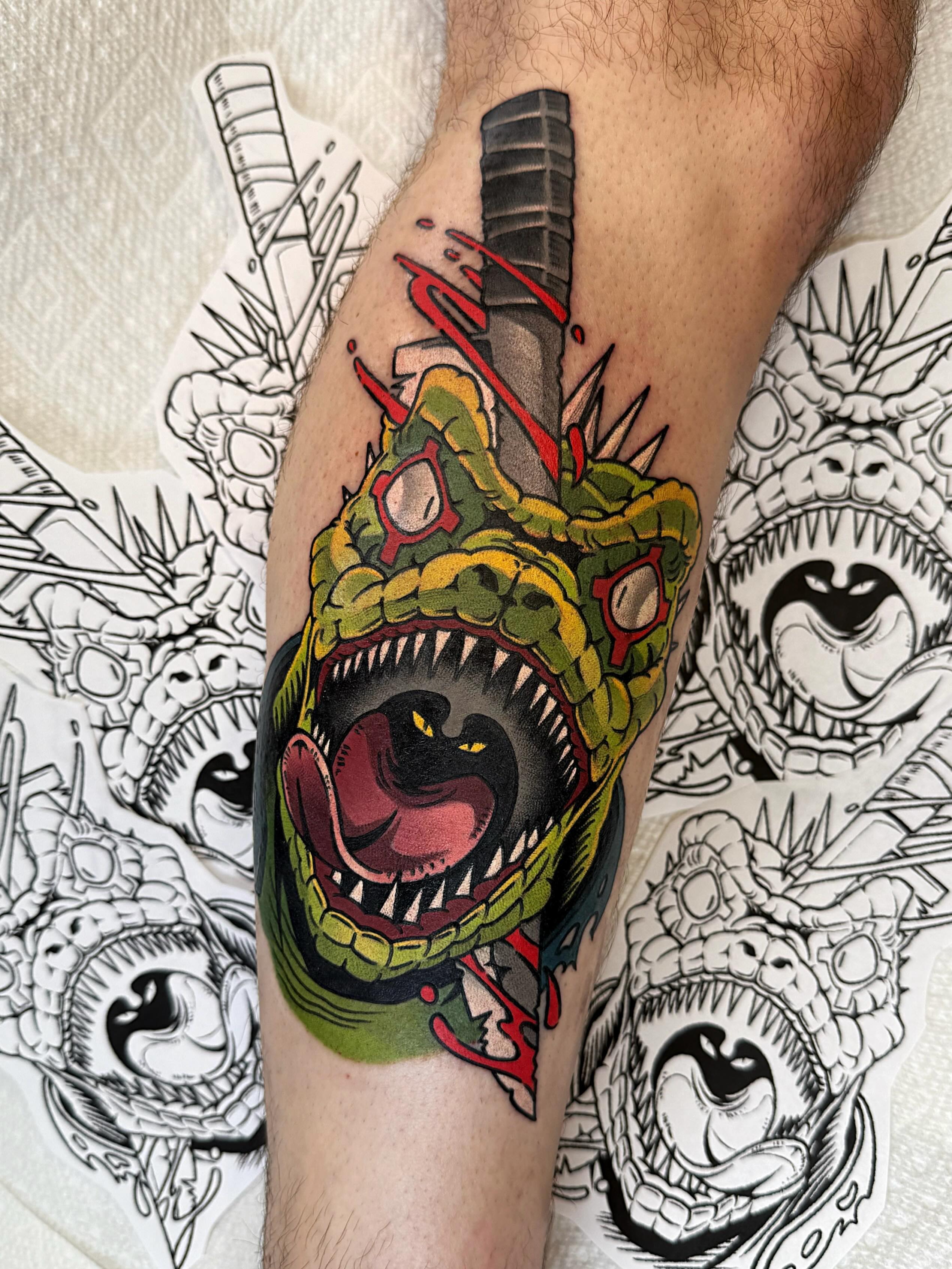 Snake American traditional tattoo on the forearm by Bold Anime Tattoos