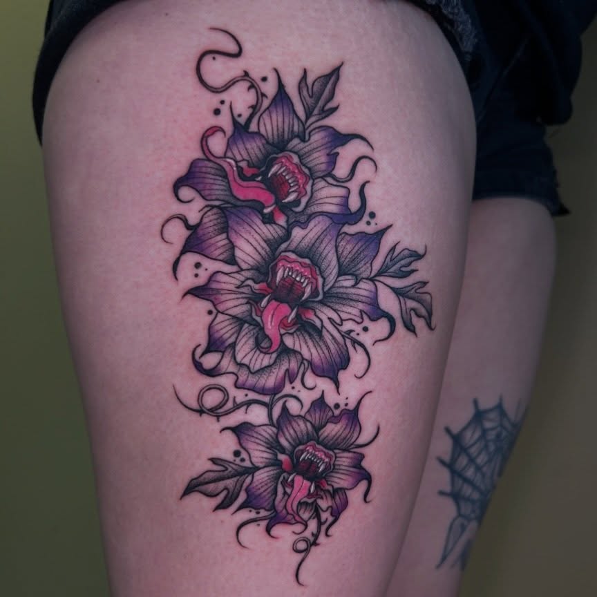 Purple orchids dotwork tattoo on the thigh by Cassy D, Miami, Florida