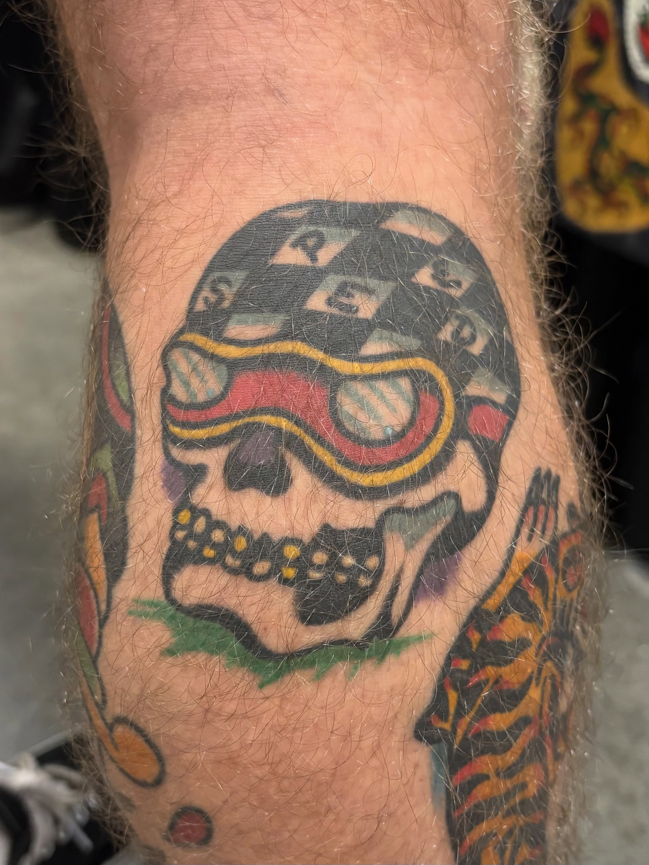 Skull with goggles American traditional tattoo on the forearm by Jake Herbert, Knoxville, Tennessee