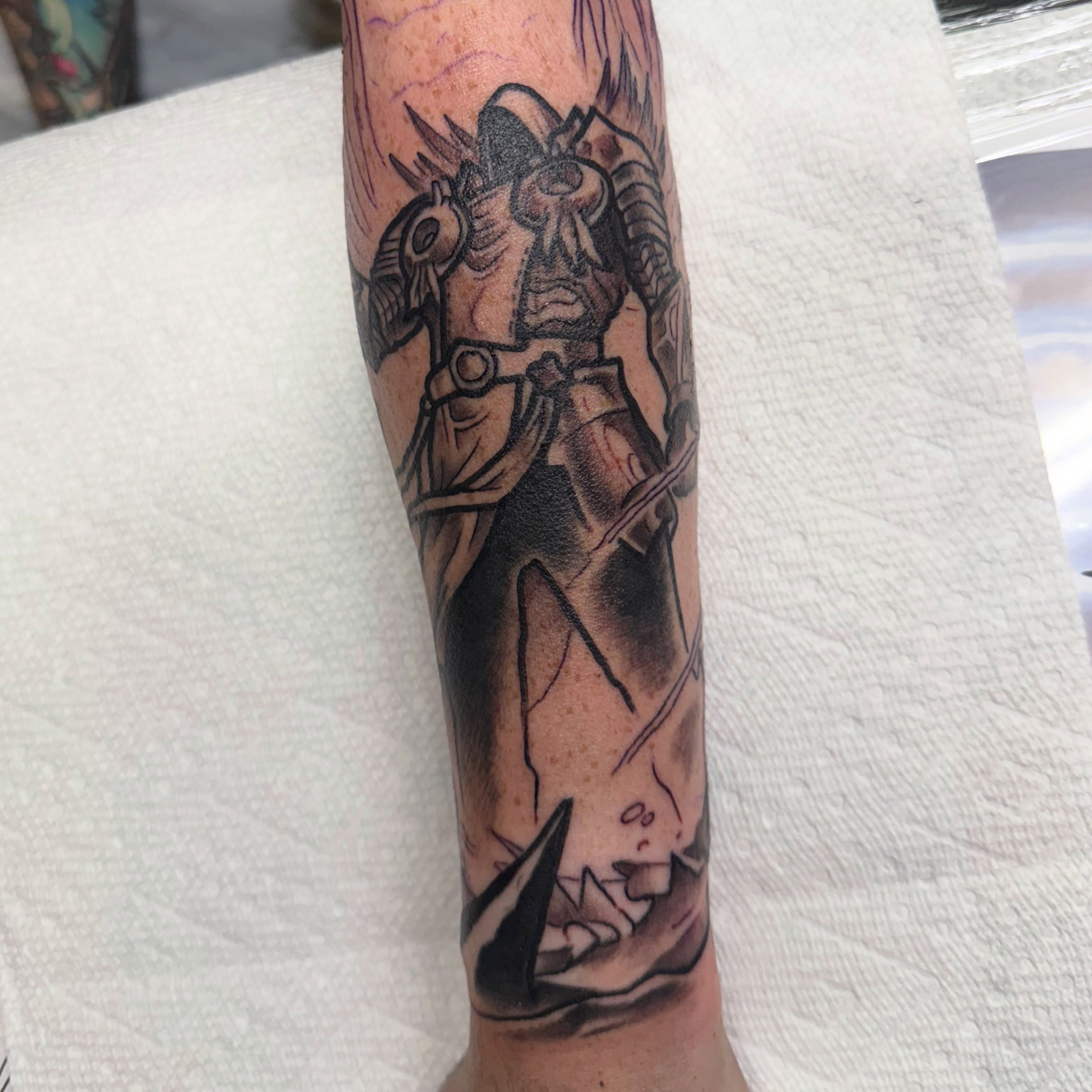 Warrior black and grey tattoo on the forearm by Will Eagle