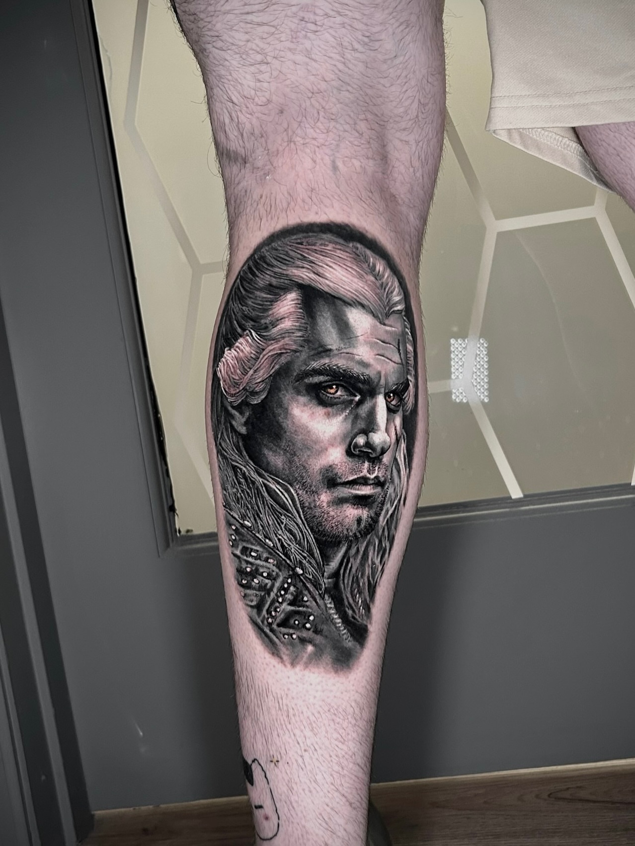 Tattoo by @ash_artsss — realism, black_and_grey