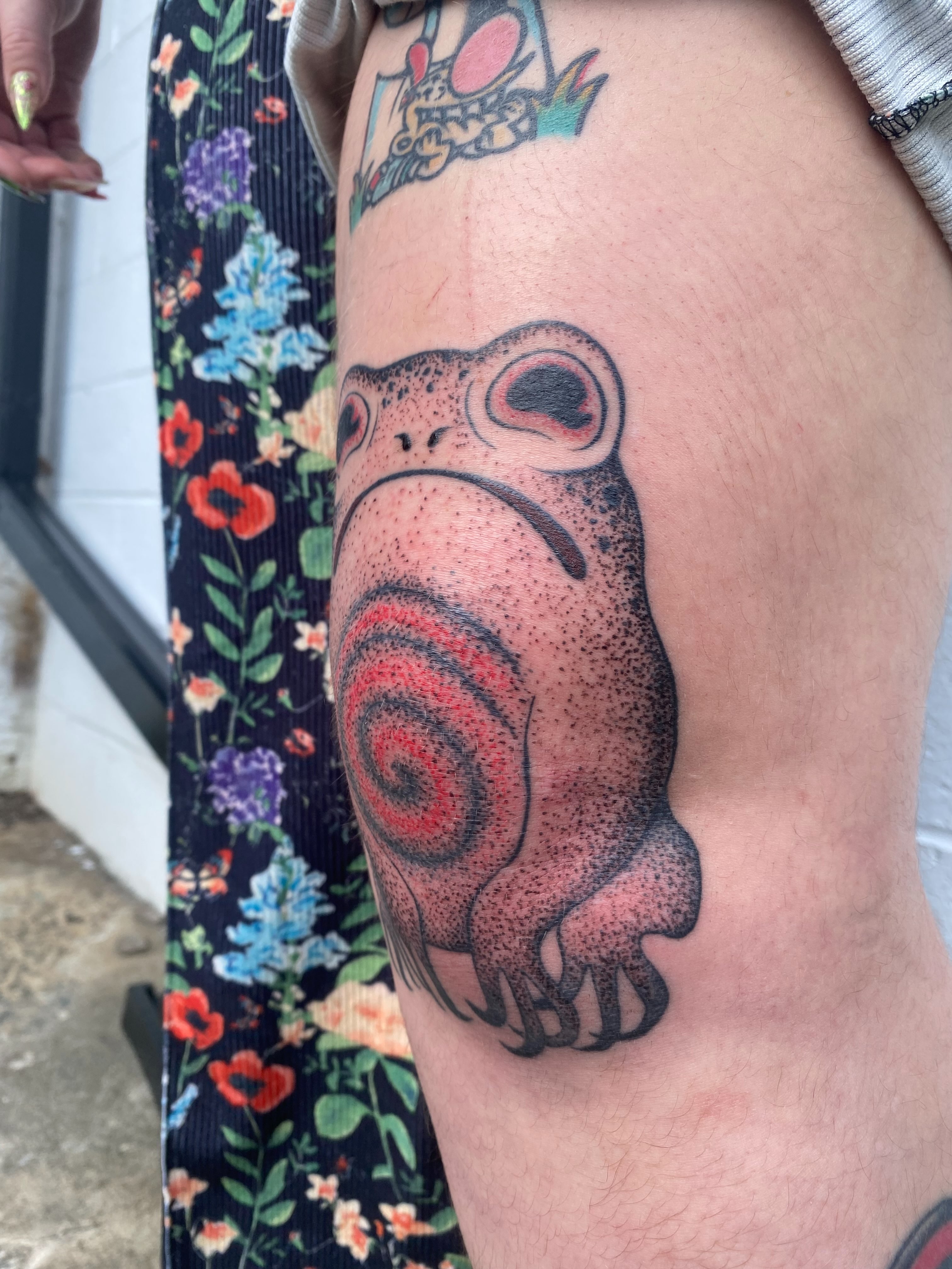 Frog dotwork tattoo on the thigh by Jesikah Rapp