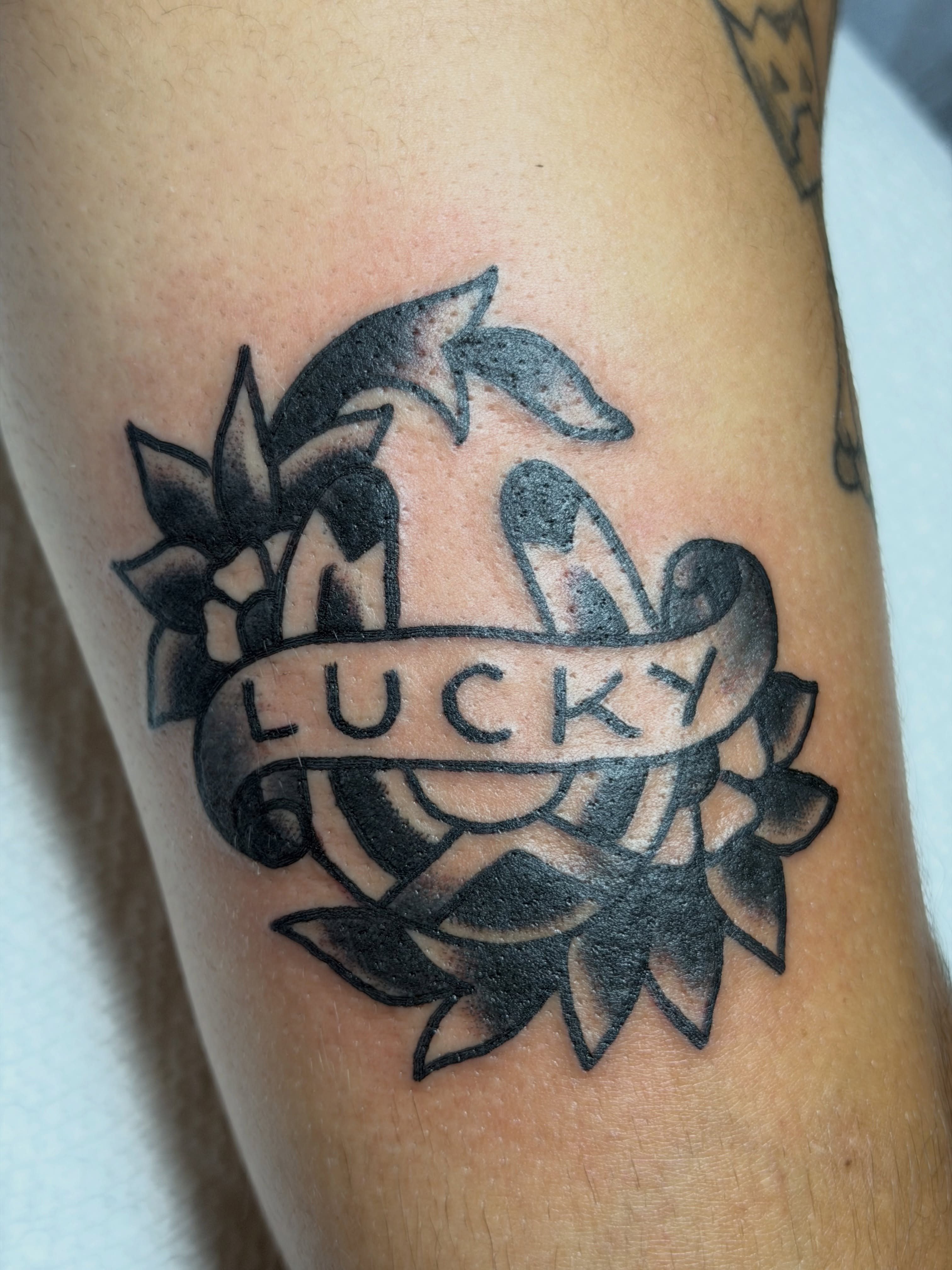 Flower and banner black and grey tattoo on the forearm by 🌈KNOXVILLE’S FAVORITE TATTOO ARTIST 👽 마법 버섯