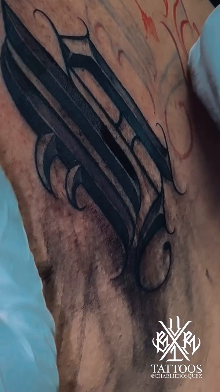 Gothic letter 'N' lettering script tattoo by El Beaver Tattoos